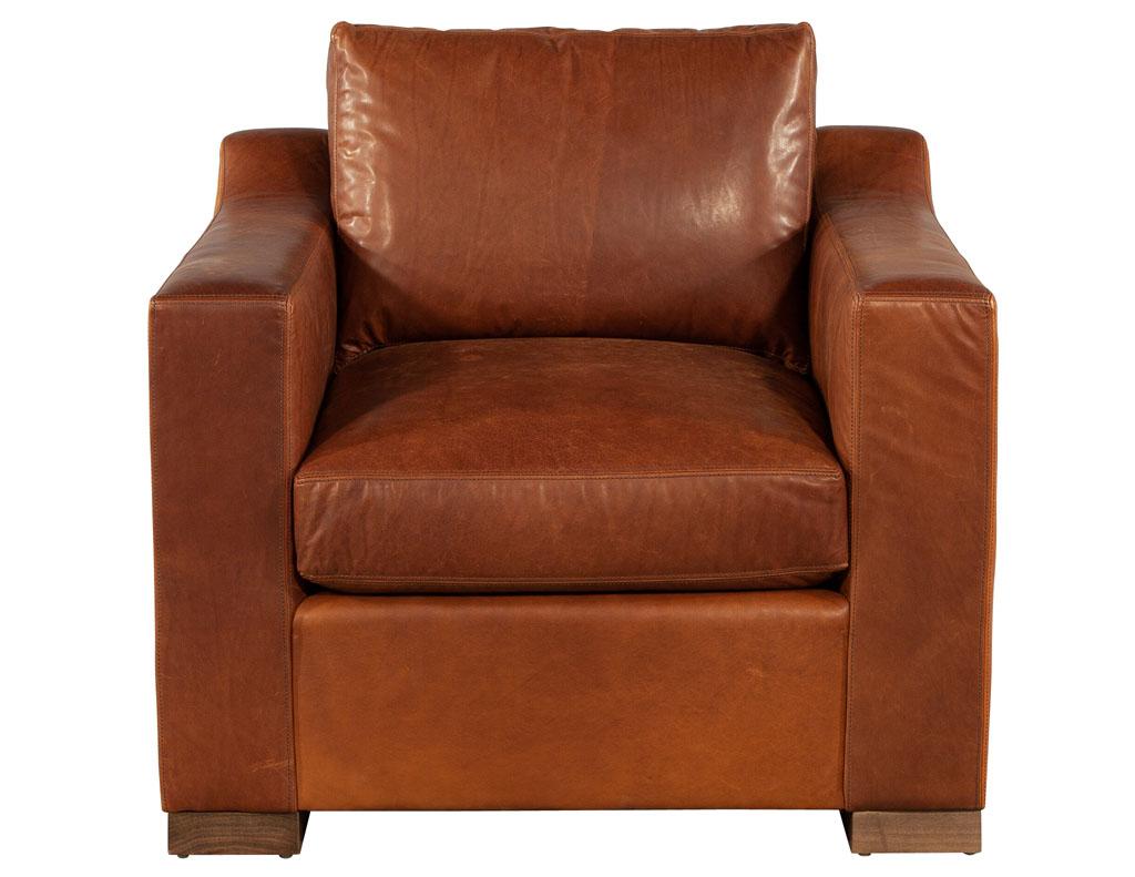 Distressed Burgundy Leather Club Chair by Ellen Degeneres Wellington Chair. Featuring plush seat and back cushion for maximum comfort. Accented with brown oak feet in a satin finish. Completed in a beautiful distressed patina burgundy leather. Price
