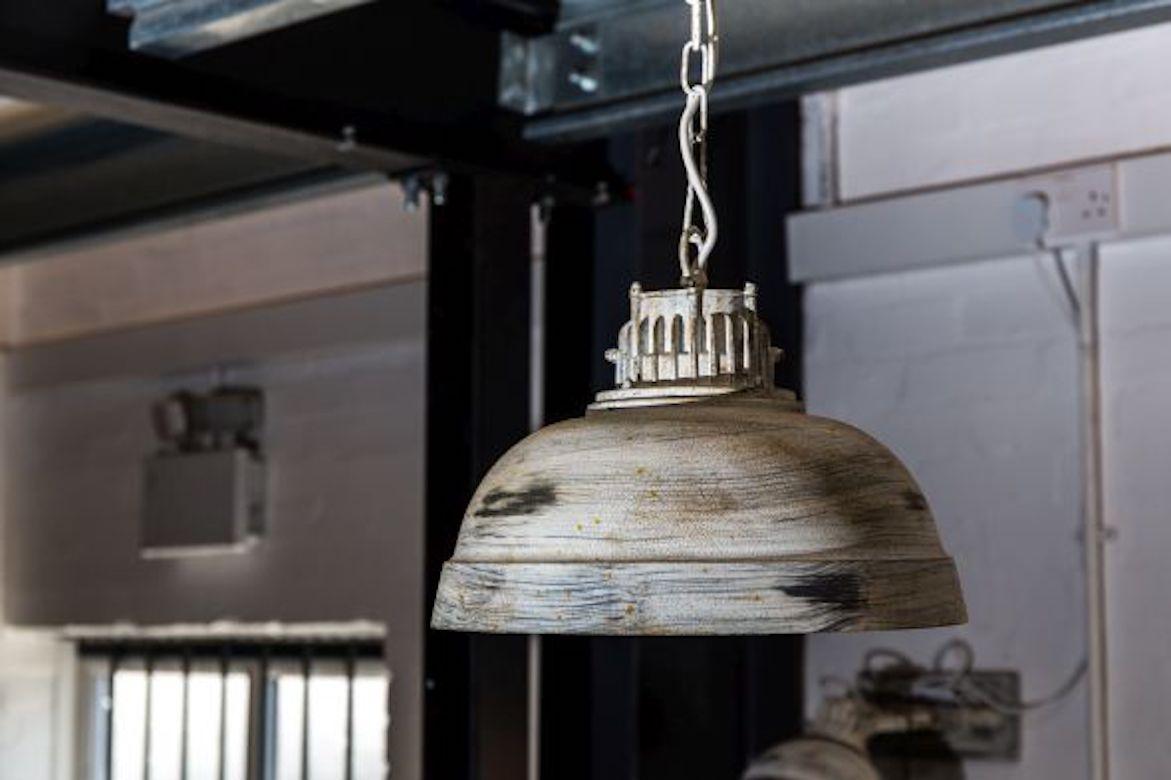 A unique distressed butler pendant ceiling light, 20th century.

This butler pendant ceiling light is ideal for use in bars and restaurants.

As well as being suitable for commercial spaces, the light would also feel at home in a domestic