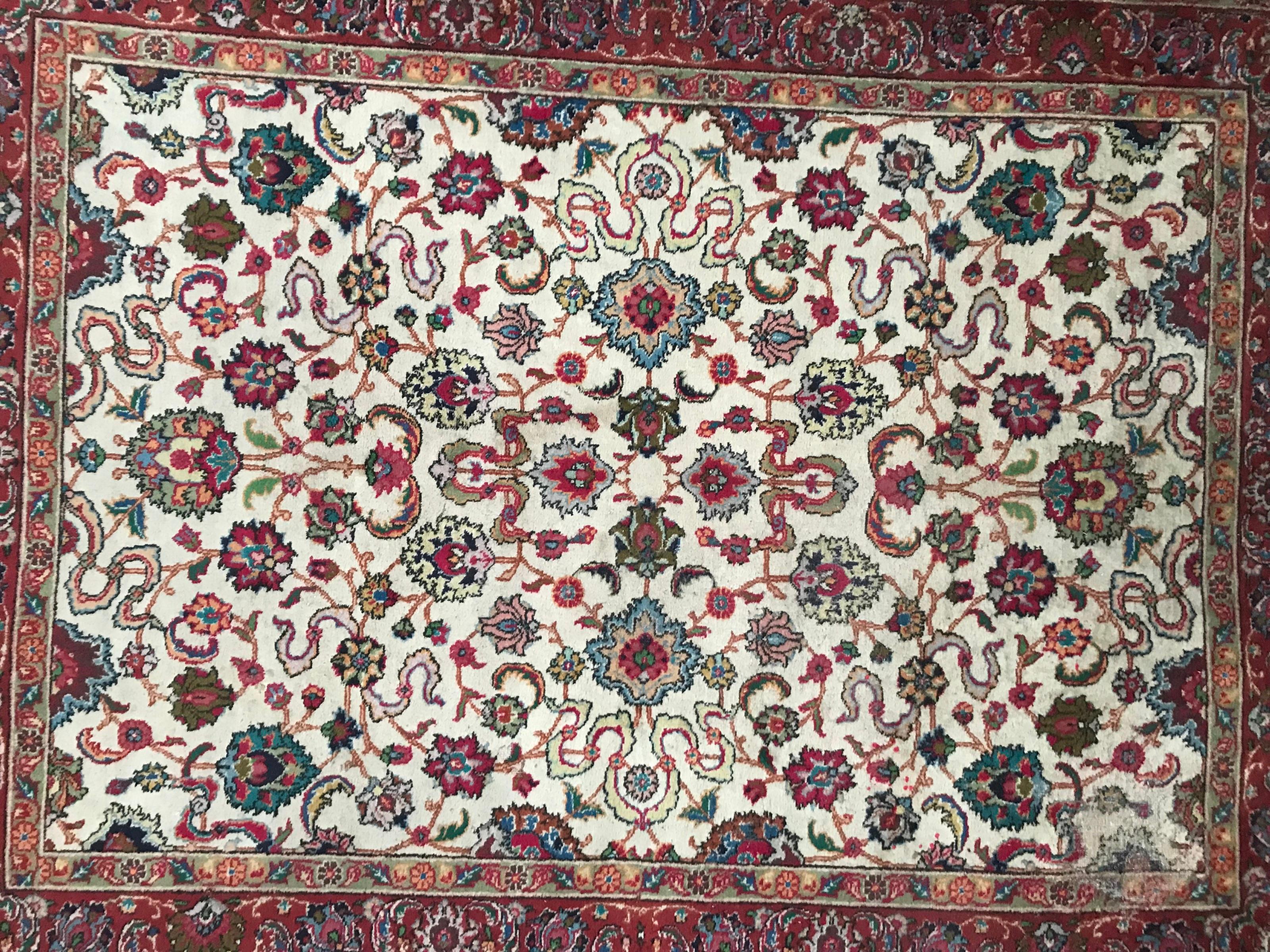 Beautiful vintage rug with nice decorative design and beautiful colors, entirely hand knotted with wool velvet on cotton foundation.