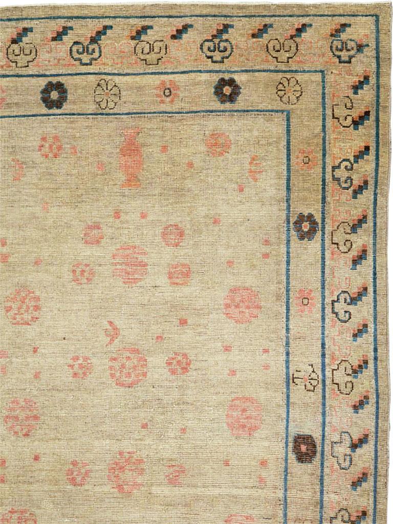 East Turkestani Distressed East Turkestan Khotan Gallery Carpet in Beige, Pink and Blue