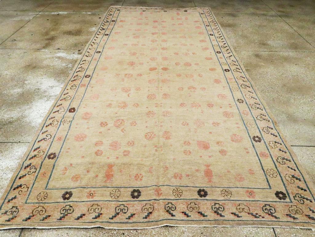 Hand-Knotted Distressed East Turkestan Khotan Gallery Carpet in Beige, Pink and Blue
