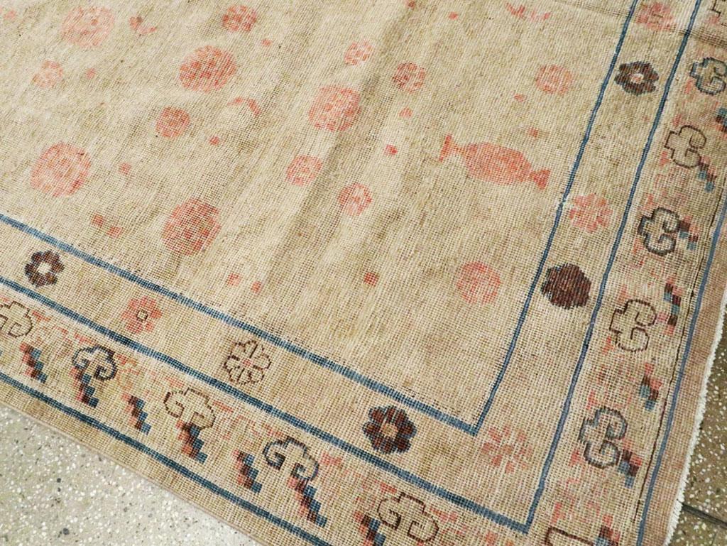 20th Century Distressed East Turkestan Khotan Gallery Carpet in Beige, Pink and Blue
