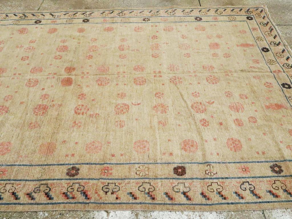 Distressed East Turkestan Khotan Gallery Carpet in Beige, Pink and Blue 1