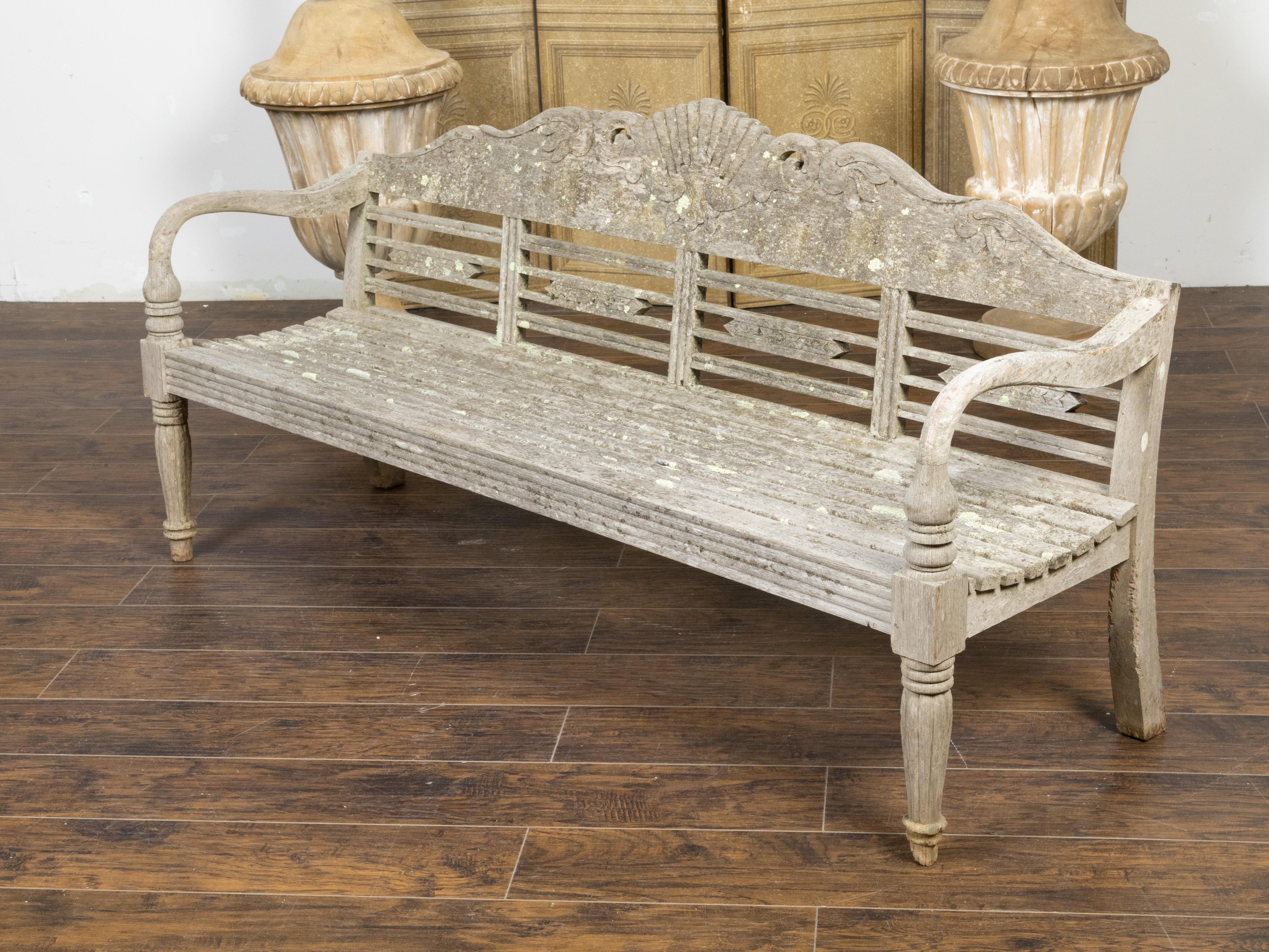 Distressed English Midcentury Light Painted Garden Bench with Carved Foliage For Sale 1