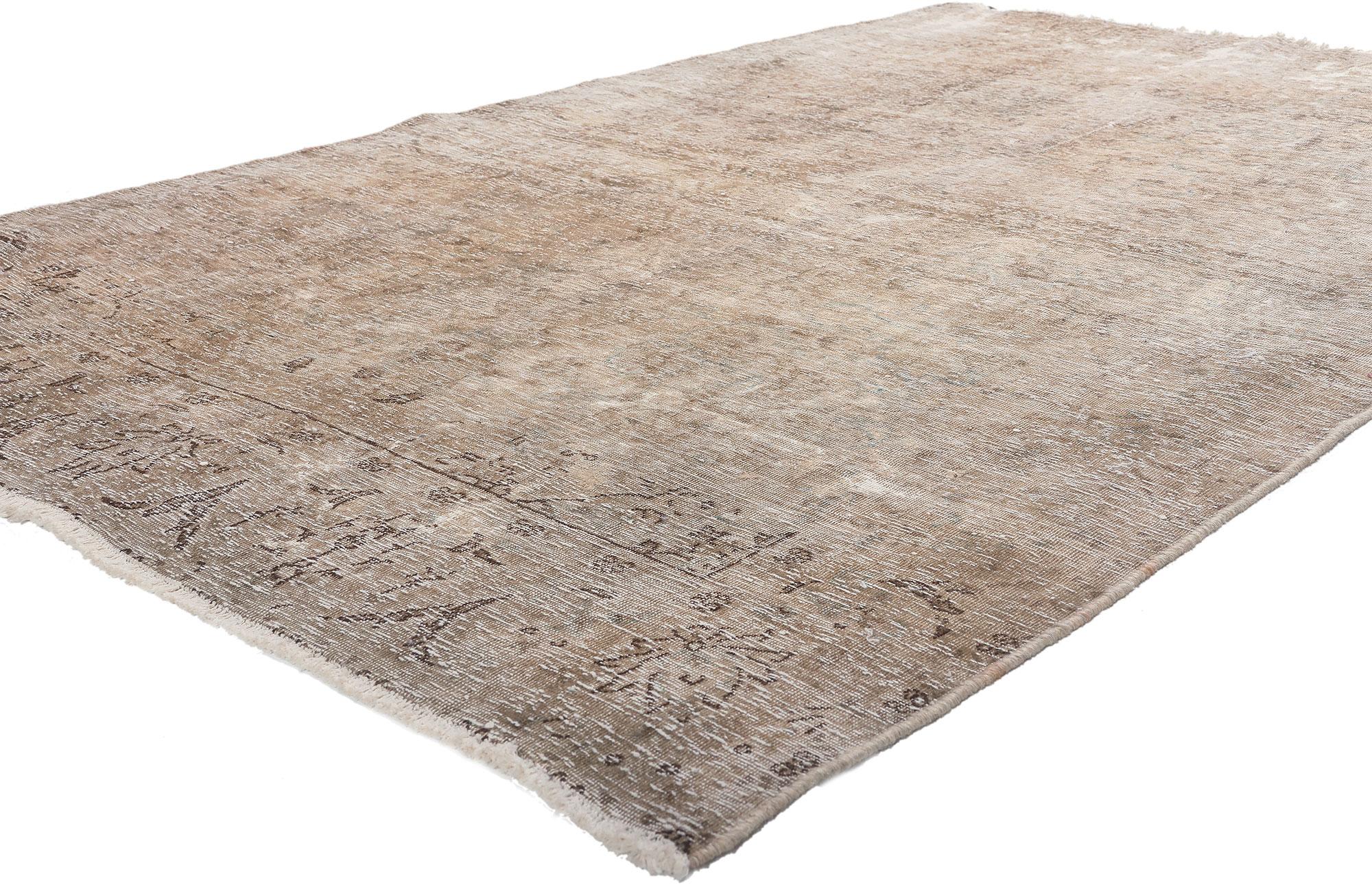 78598 Distressed Vintage Persian Tabriz Rug, 04'10 x 07'09. 
Weathered charm meets industrial luxe style in this distressed vintage Persian Tabriz rug. The washed-out floral pattern and muted earthy hues woven into this piece work together creating