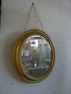 Distressed Gilt Oval Antiqued Mirror Hung by Rope