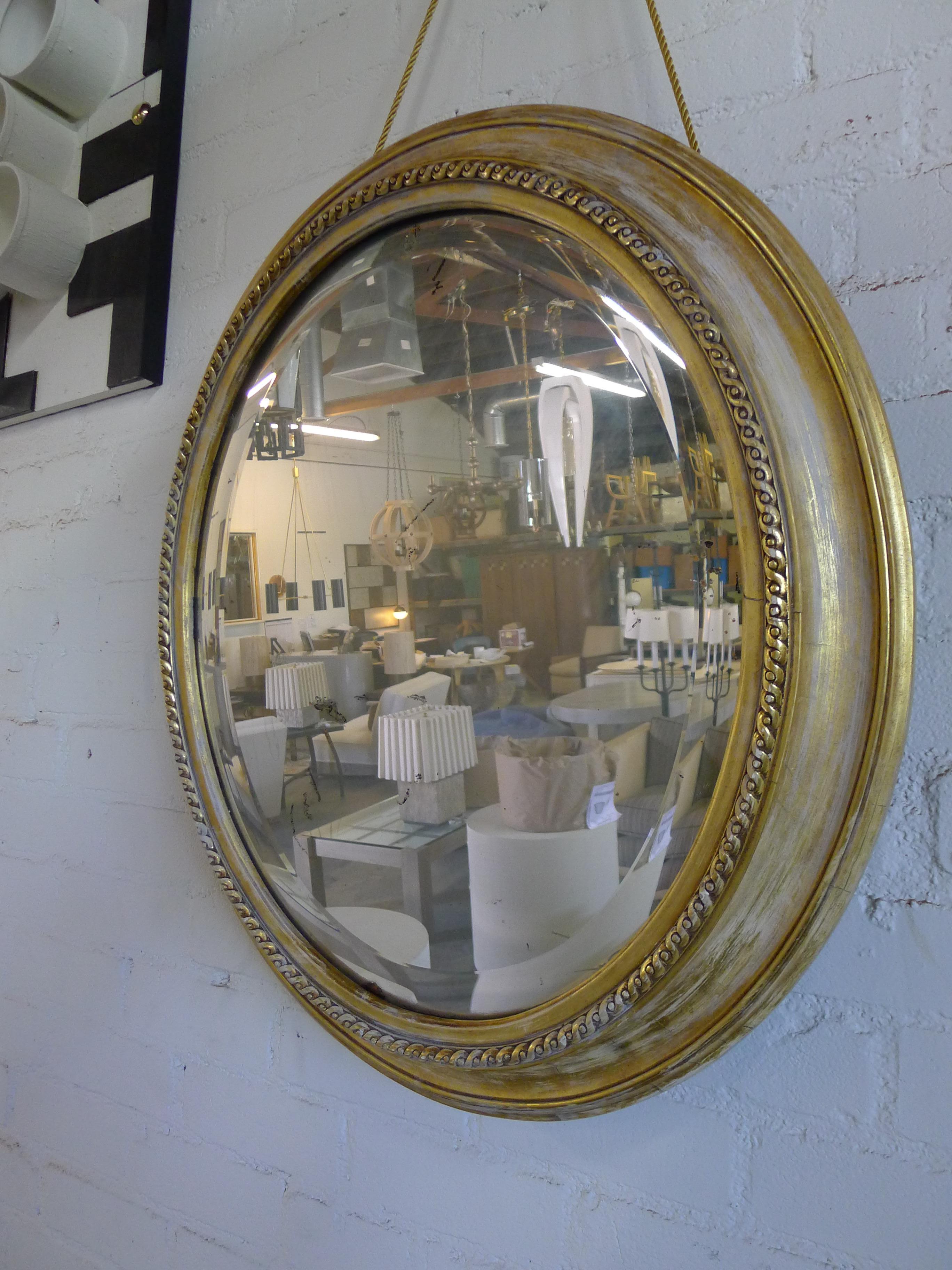 Neoclassical Distressed Gilt Oval Antiqued Mirror Hung by Rope For Sale
