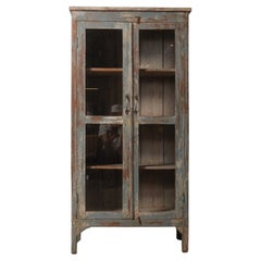 Distressed Glass-Front Cabinet with Weathered Blue Finish Distressed Glass-Front Cabinet with Weathered Blue Finish