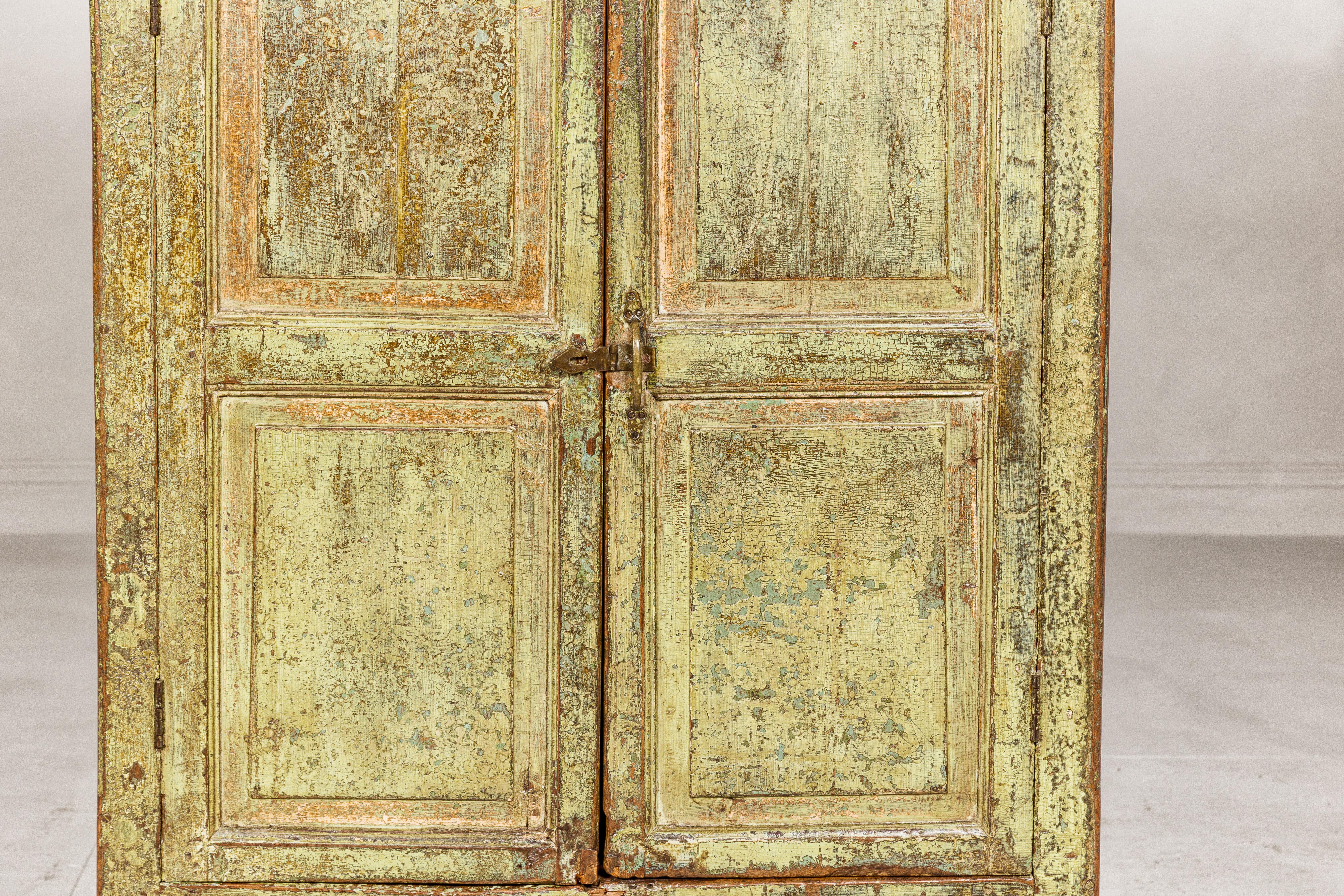 19th Century Distressed Green Painted Indian Cabinet with Paneled Doors and Two Drawers For Sale
