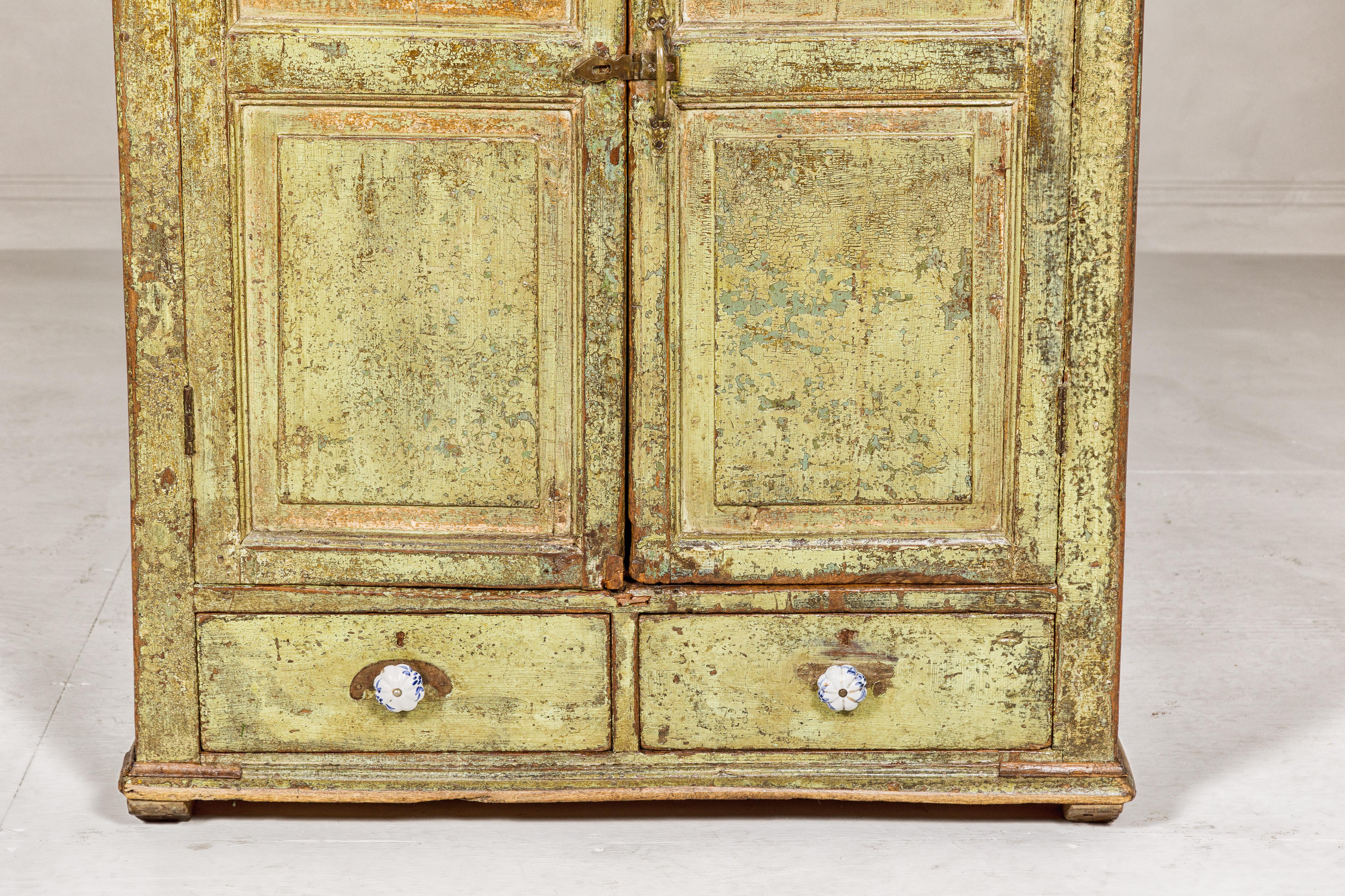 Wood Distressed Green Painted Indian Cabinet with Paneled Doors and Two Drawers For Sale