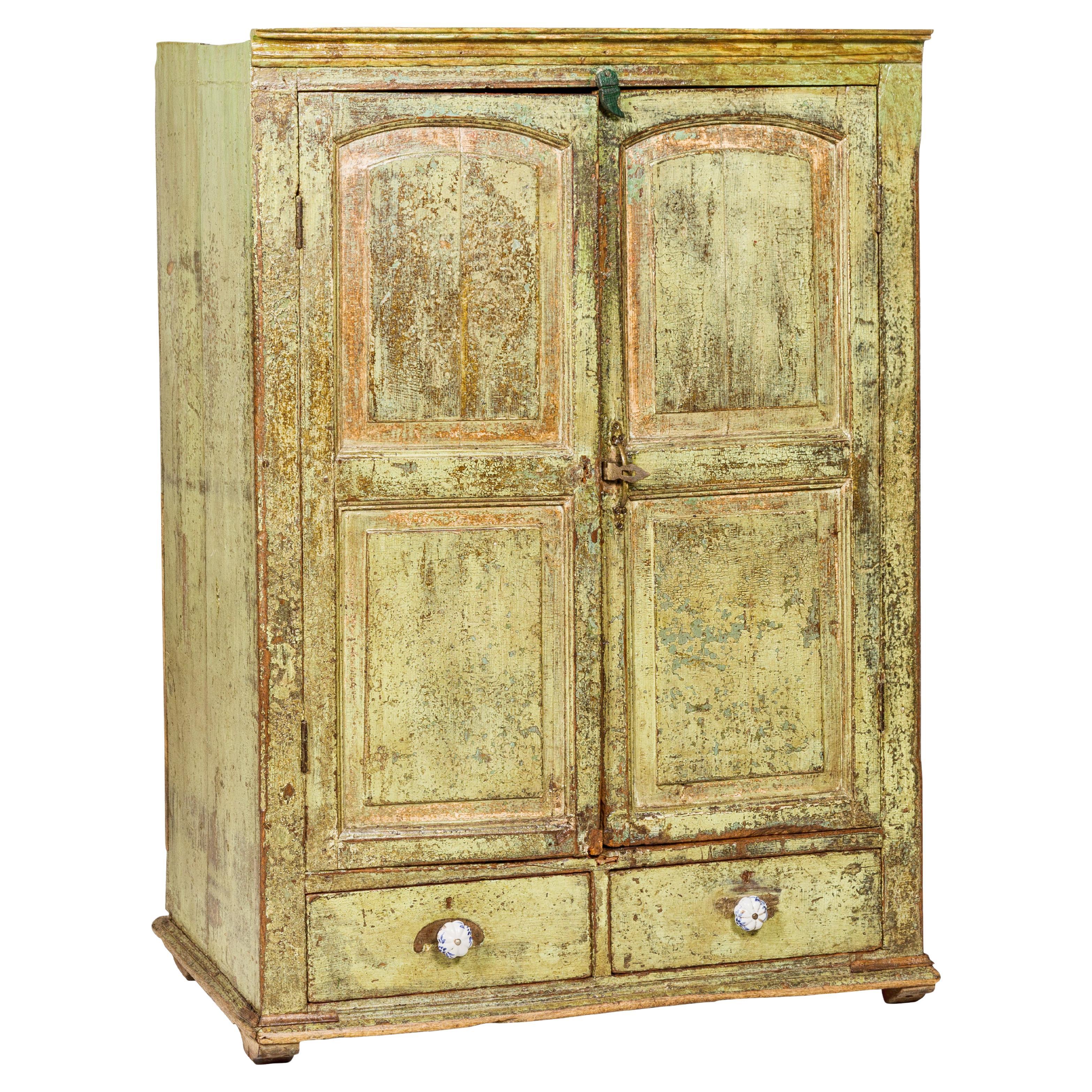 Distressed Green Painted Indian Cabinet with Paneled Doors and Two Drawers For Sale