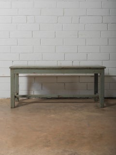 Distressed Green Wooden Bench with Weathered Patina