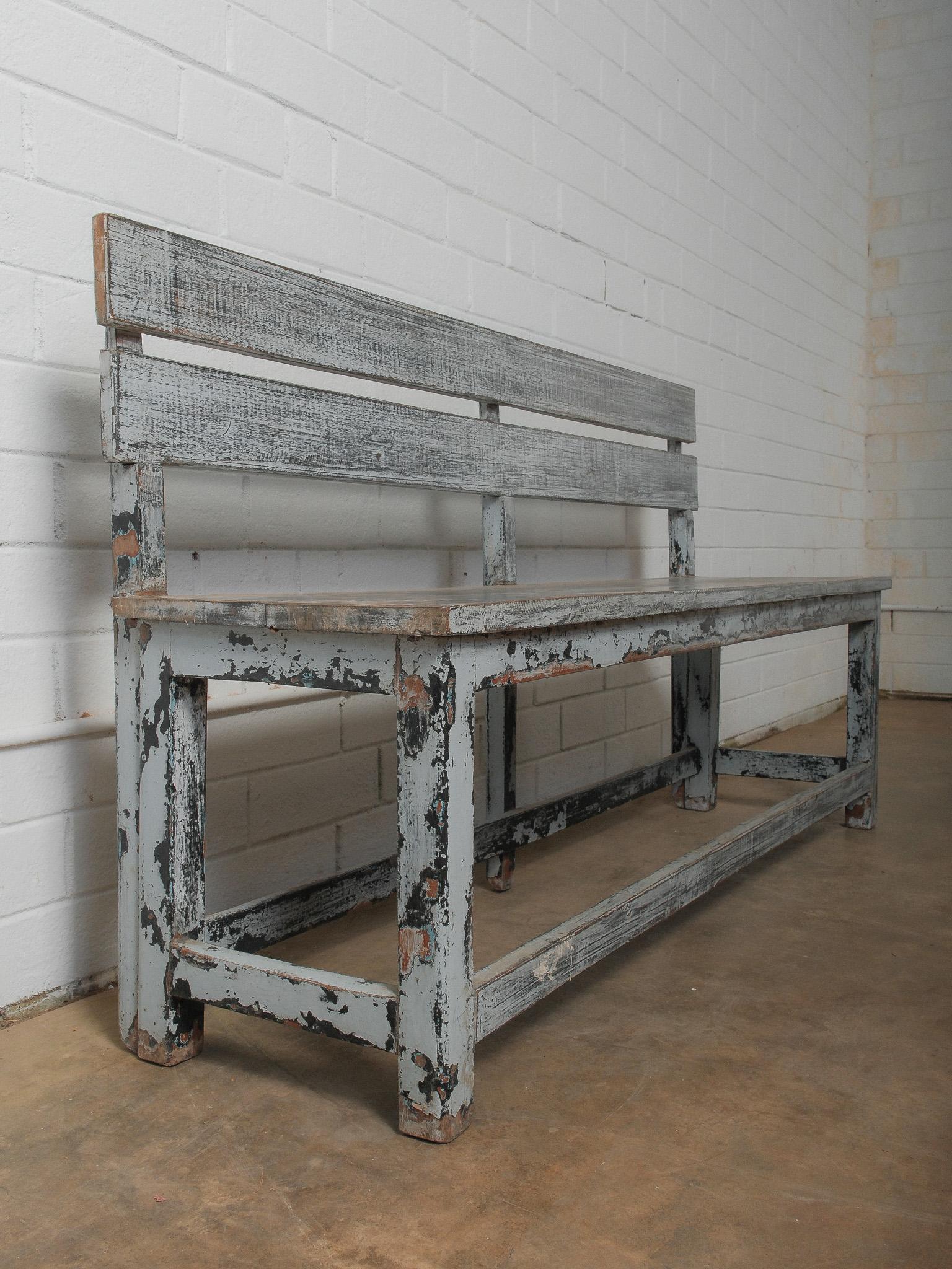 Distressed Grey Wooden Bench with Layered Patina For Sale 1