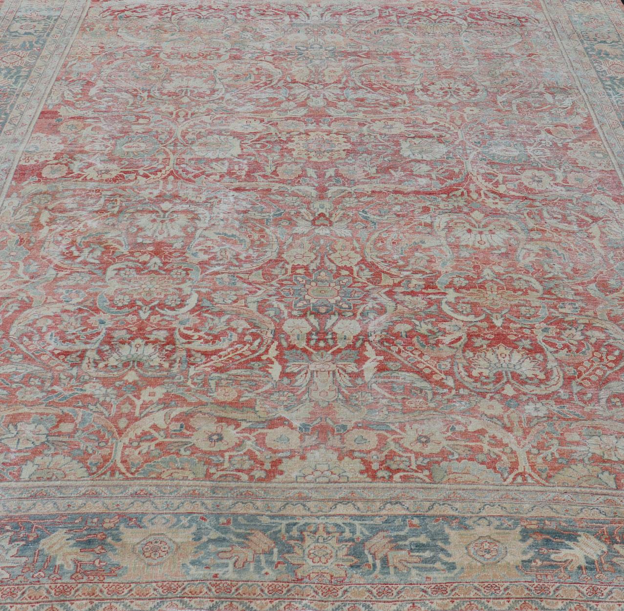 20th Century Distressed Hand Knotted Antique Persian Sultanabad Rug Faded Red and Blue Colors For Sale