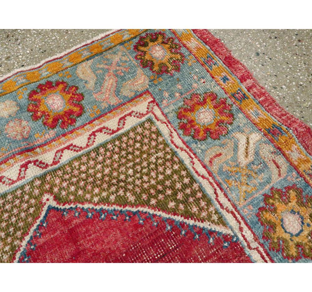 20th Century Distressed Handmade Turkish Rug in Crimson Red and Light Blue