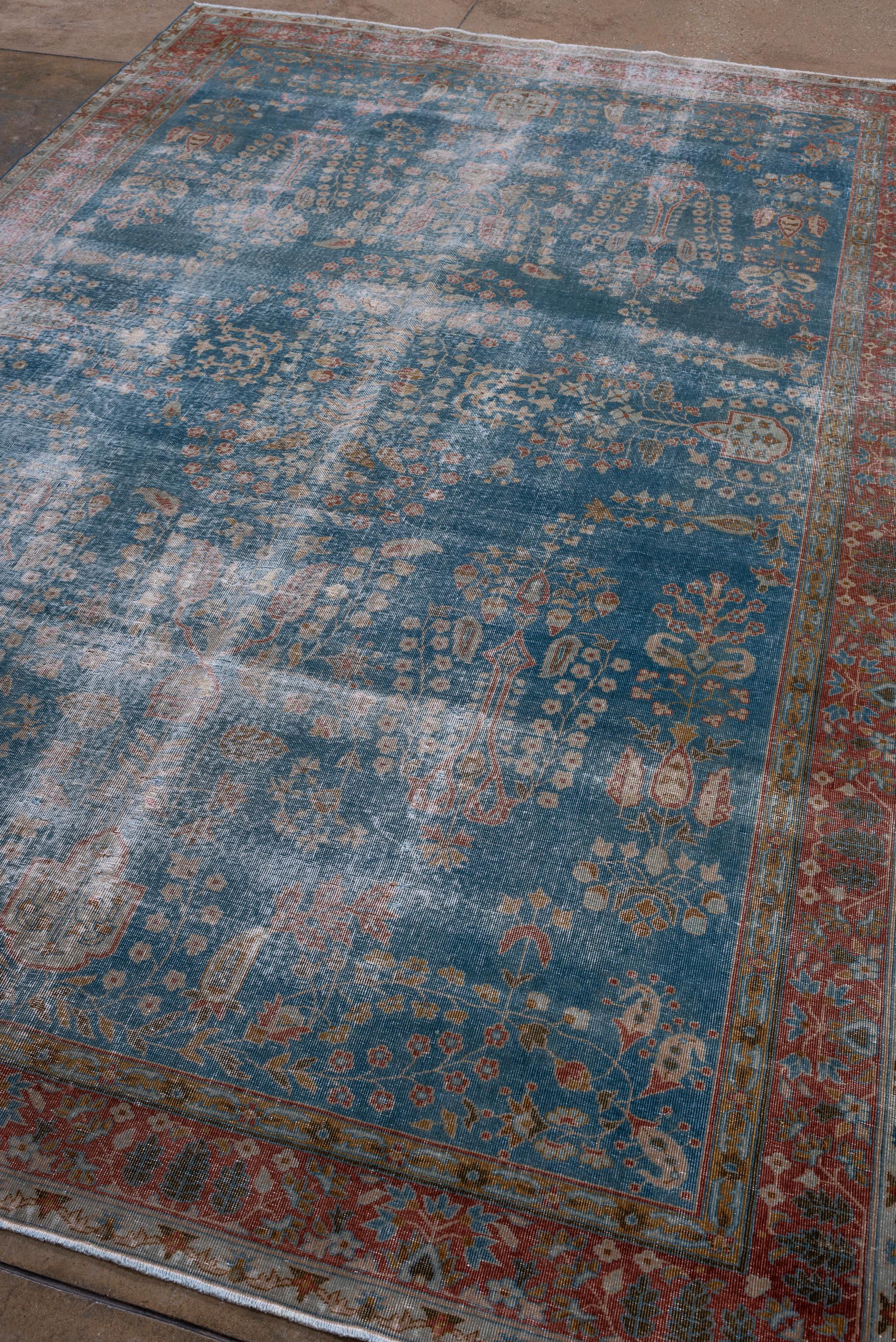 Persian Distressed Kerman Rug with Royal Blue Field and Floral Design, Circa 1920's