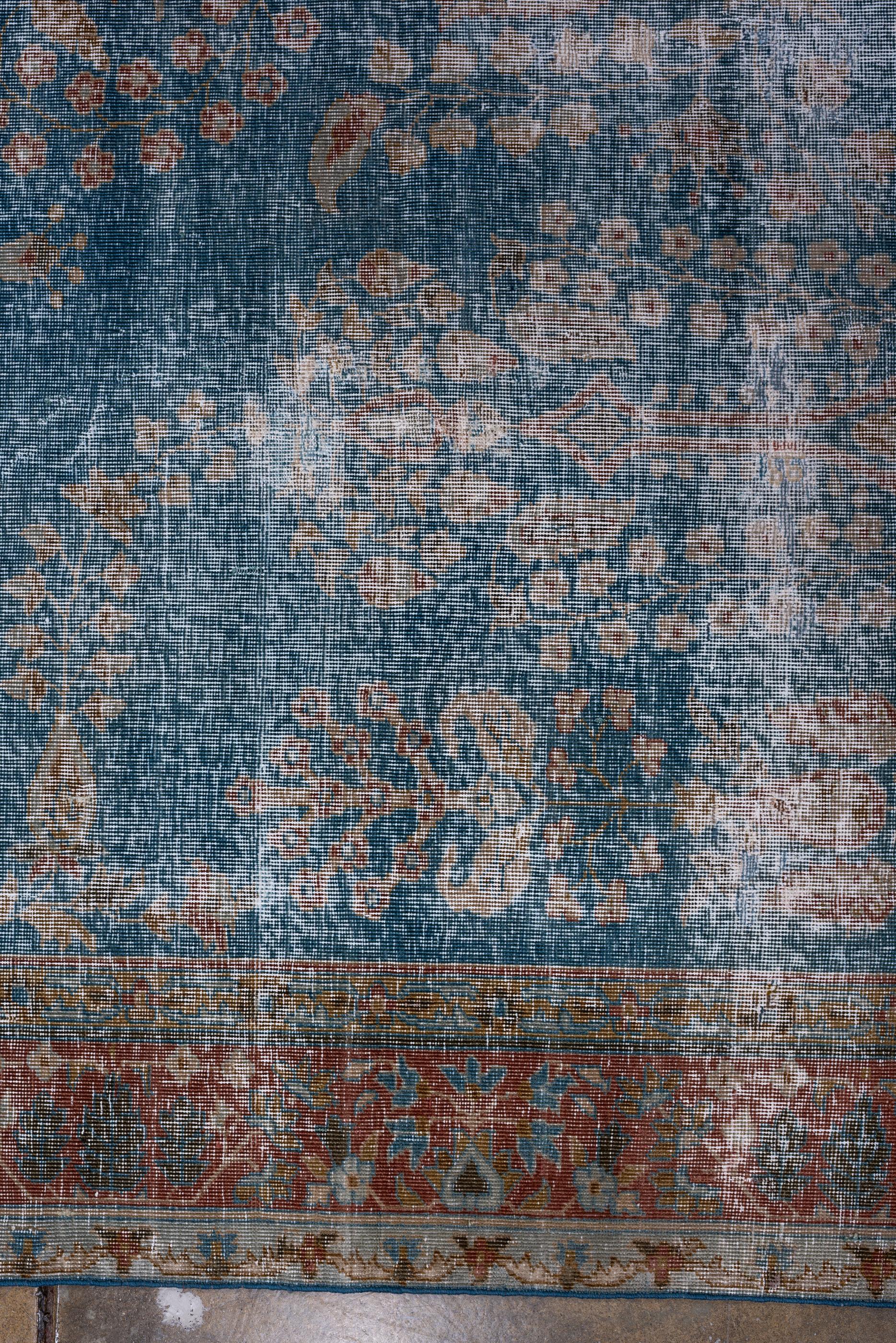 Distressed Kerman Rug with Royal Blue Field and Floral Design, Circa 1920's In Good Condition In New York, NY