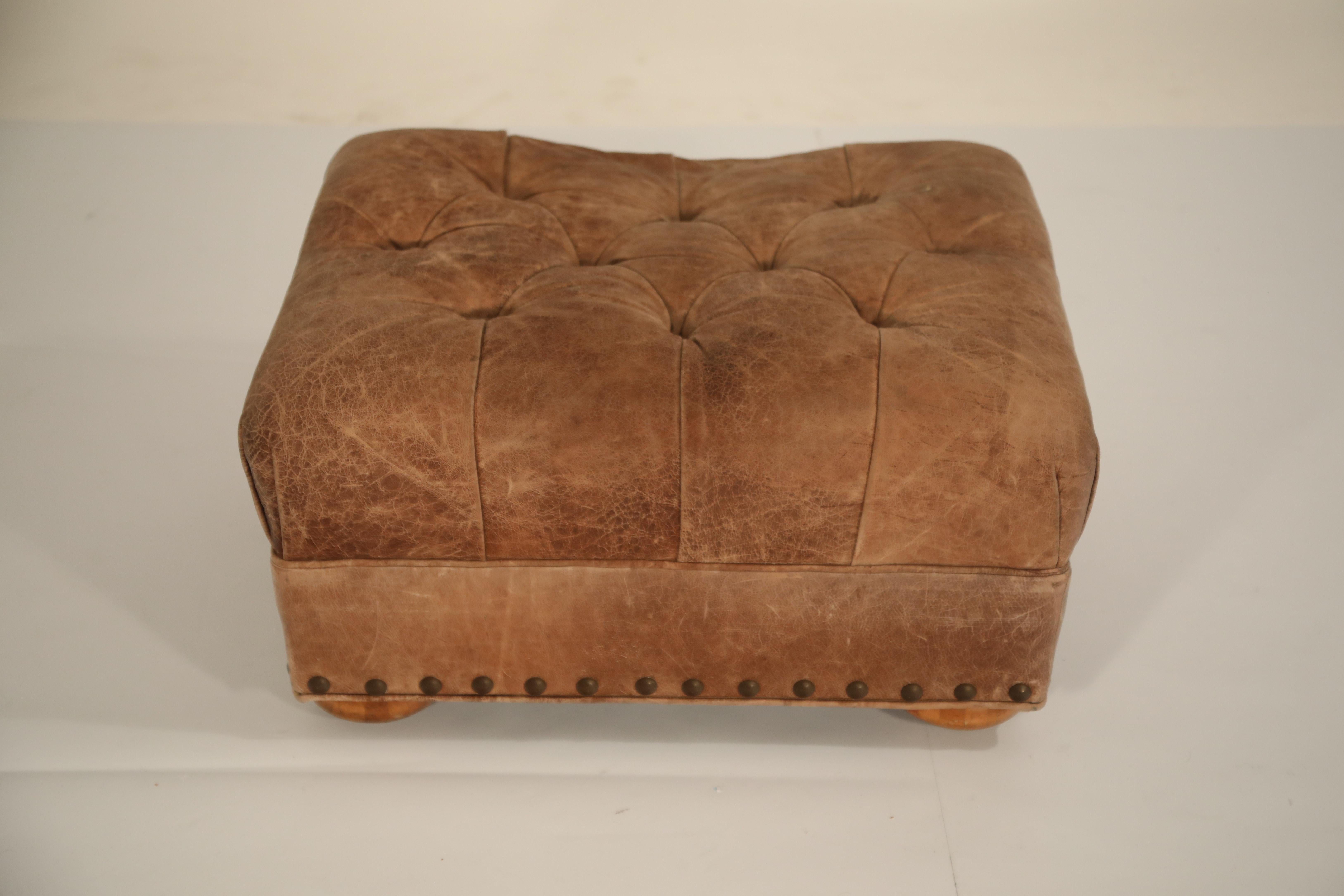 Distressed Leather Armchair and Ottoman in the Style of Ralph Lauren In Good Condition In Los Angeles, CA