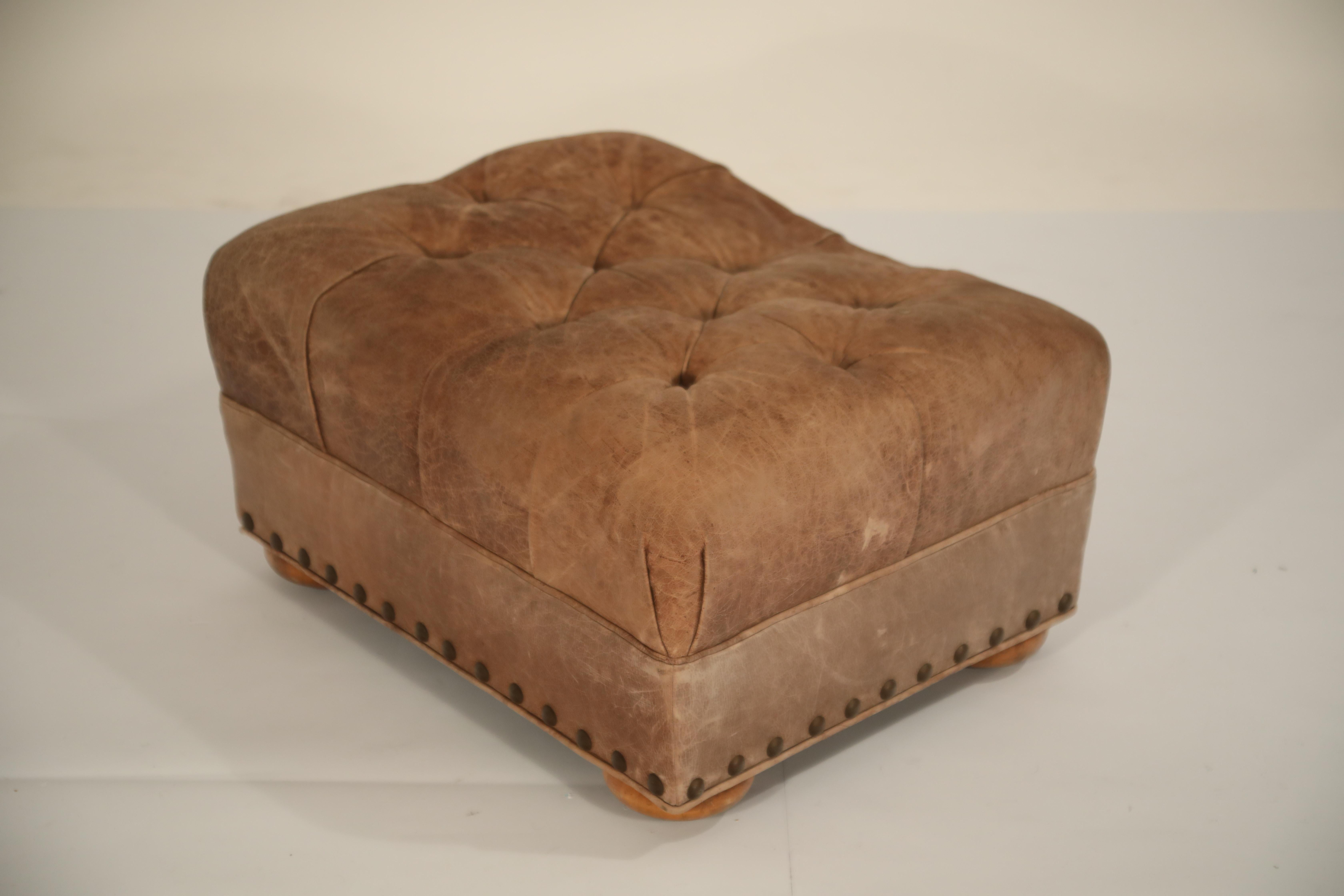 Contemporary Distressed Leather Armchair and Ottoman in the Style of Ralph Lauren