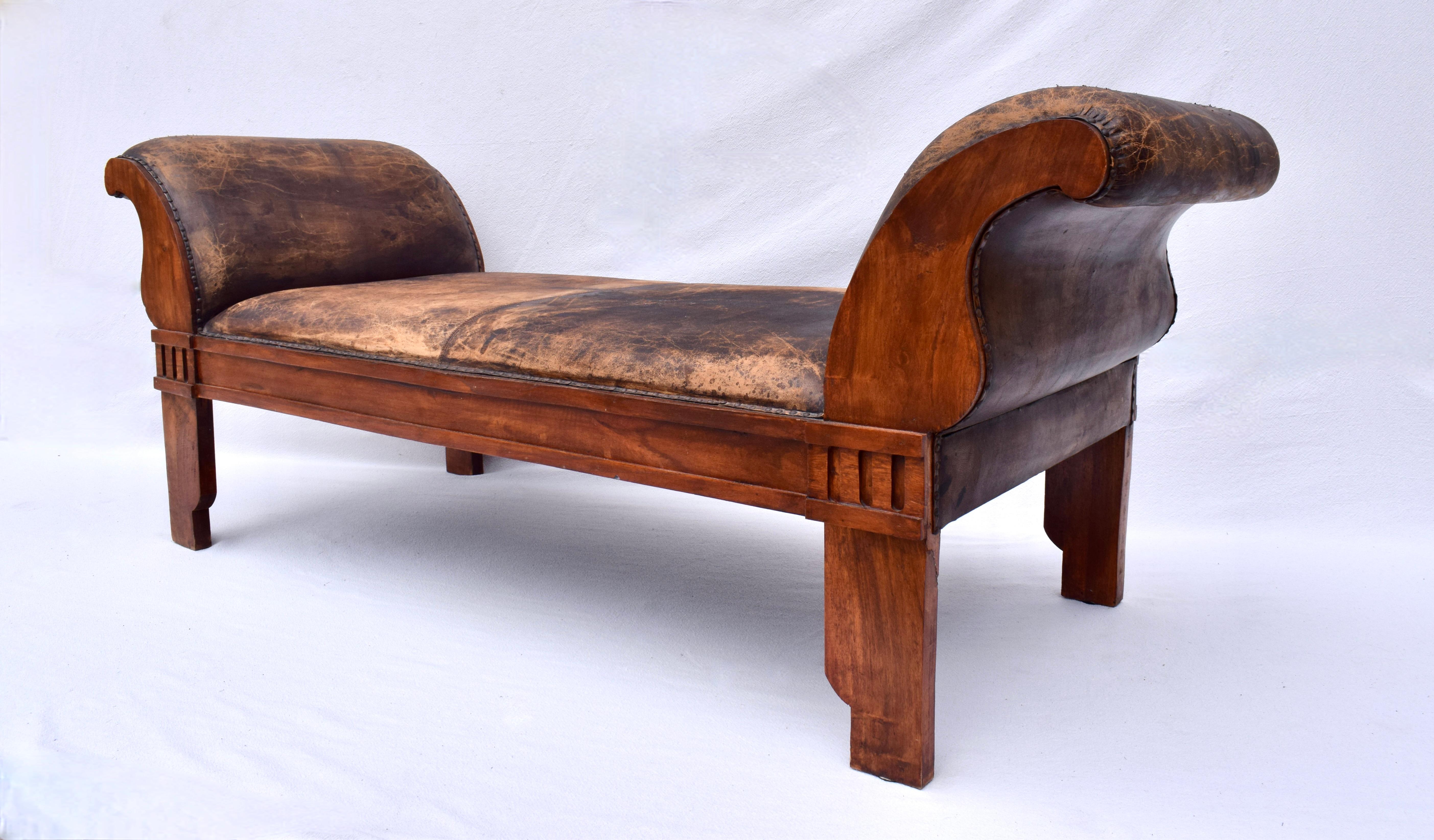 Late 20th Century Distressed Leather Rolled Arm carved Oak Bench For Sale