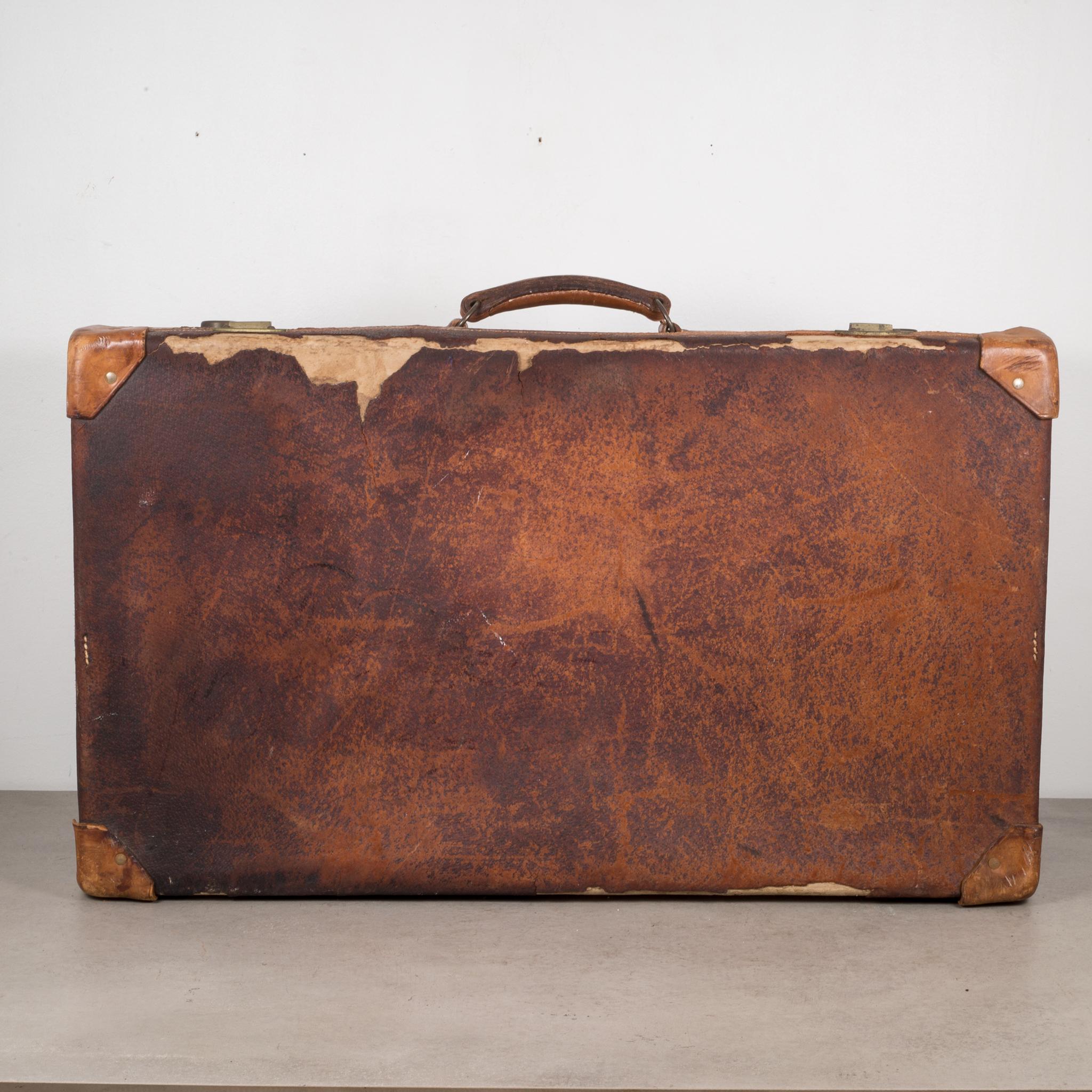 About

A distressed leather suitcase with leather handle, fabric interior and brass locks. Key is missing.

Creator: Unknown.
Date of manufacture: circa 1940.
Materials and techniques: Leather, Brass.
Condition: Distressed. Wear consistent with age