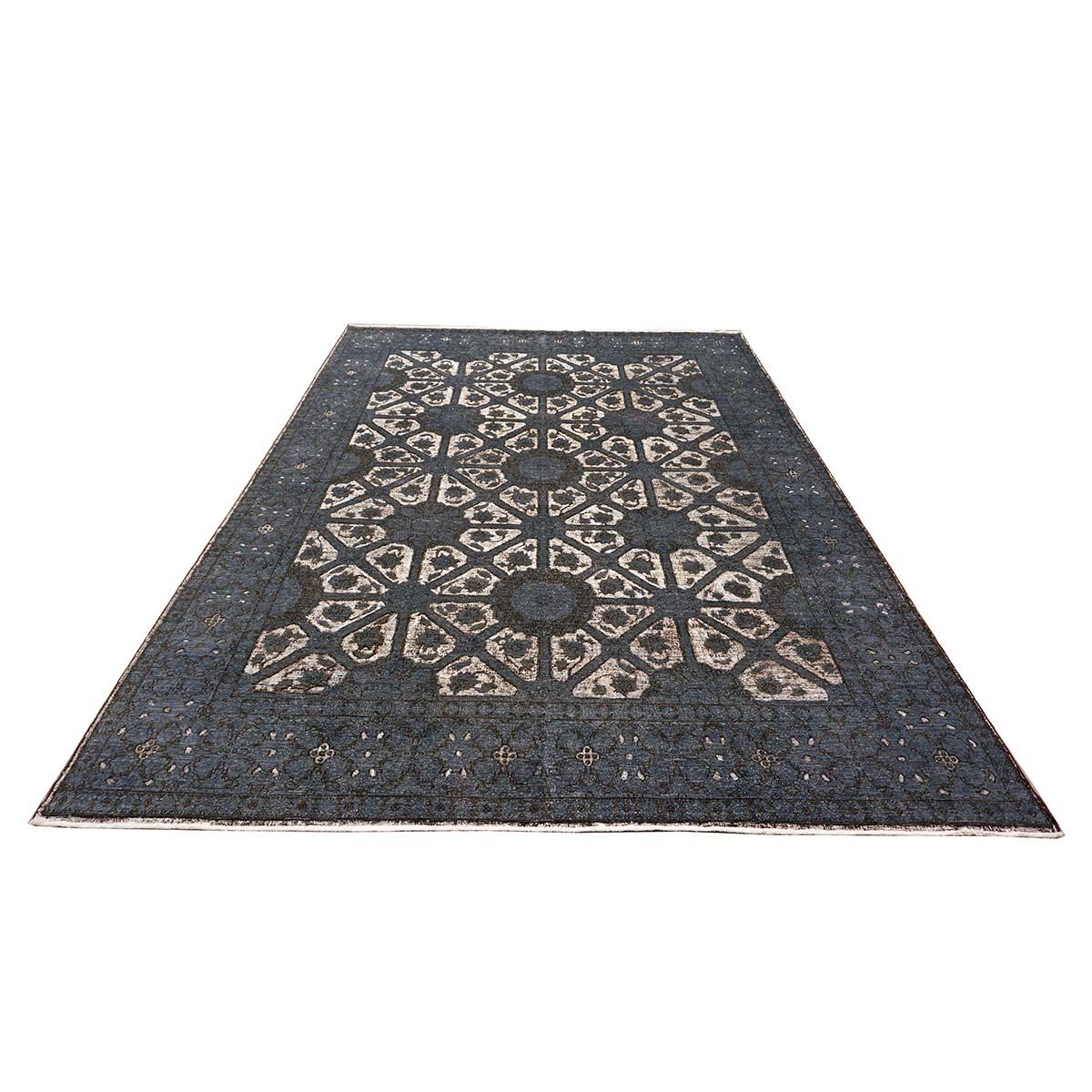 Ashly Fine Rugs presents a new distressed modern Afghan rug. These rugs have been overdyed and distressed with a custom design to give them an antique feel, but yet a modern look. This piece was overdyed with a beautiful slate color, along with the
