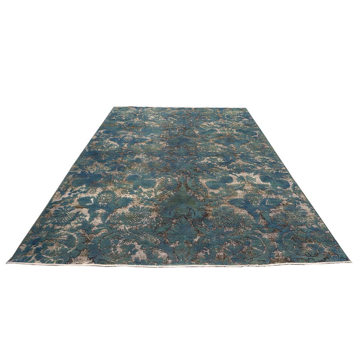 Ashly Fine Rugs presents a new distressed modern Afghan rug. These rugs have been overdyed and distressed with a custom design to give them an antique feel, but yet a modern look. This piece was overdyed with a beautiful teal blue color, along with