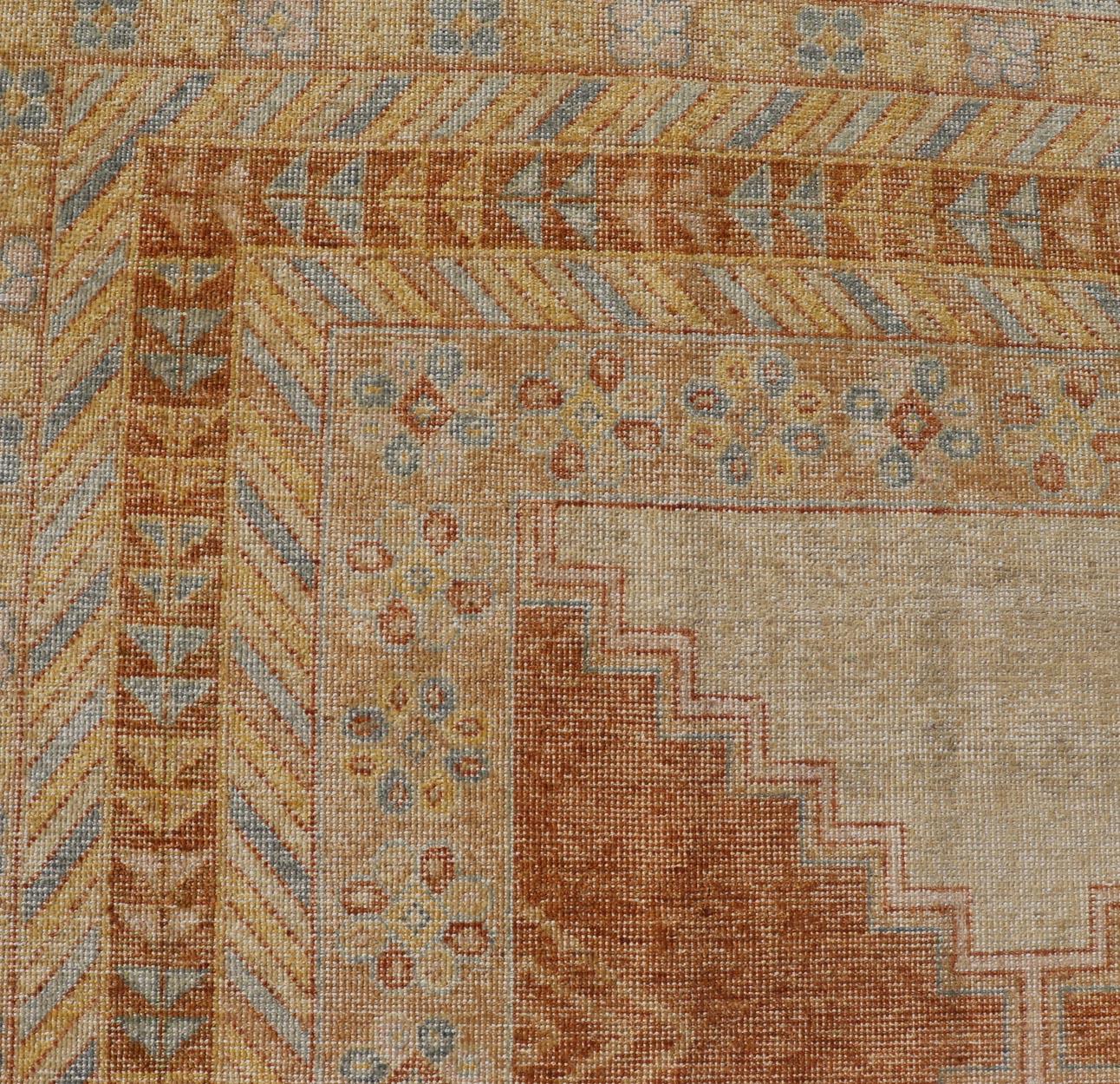  Distressed Modern Khotan Design Rug with Diamond & Geometric Pattern Khotan Design distressed Rug with In Ivory, Burnt Orange, light green, light blue and yellow colors. Keivan Woven Arts/ rug RJK-24848-JPR-011-01 country of origin / type: India /
