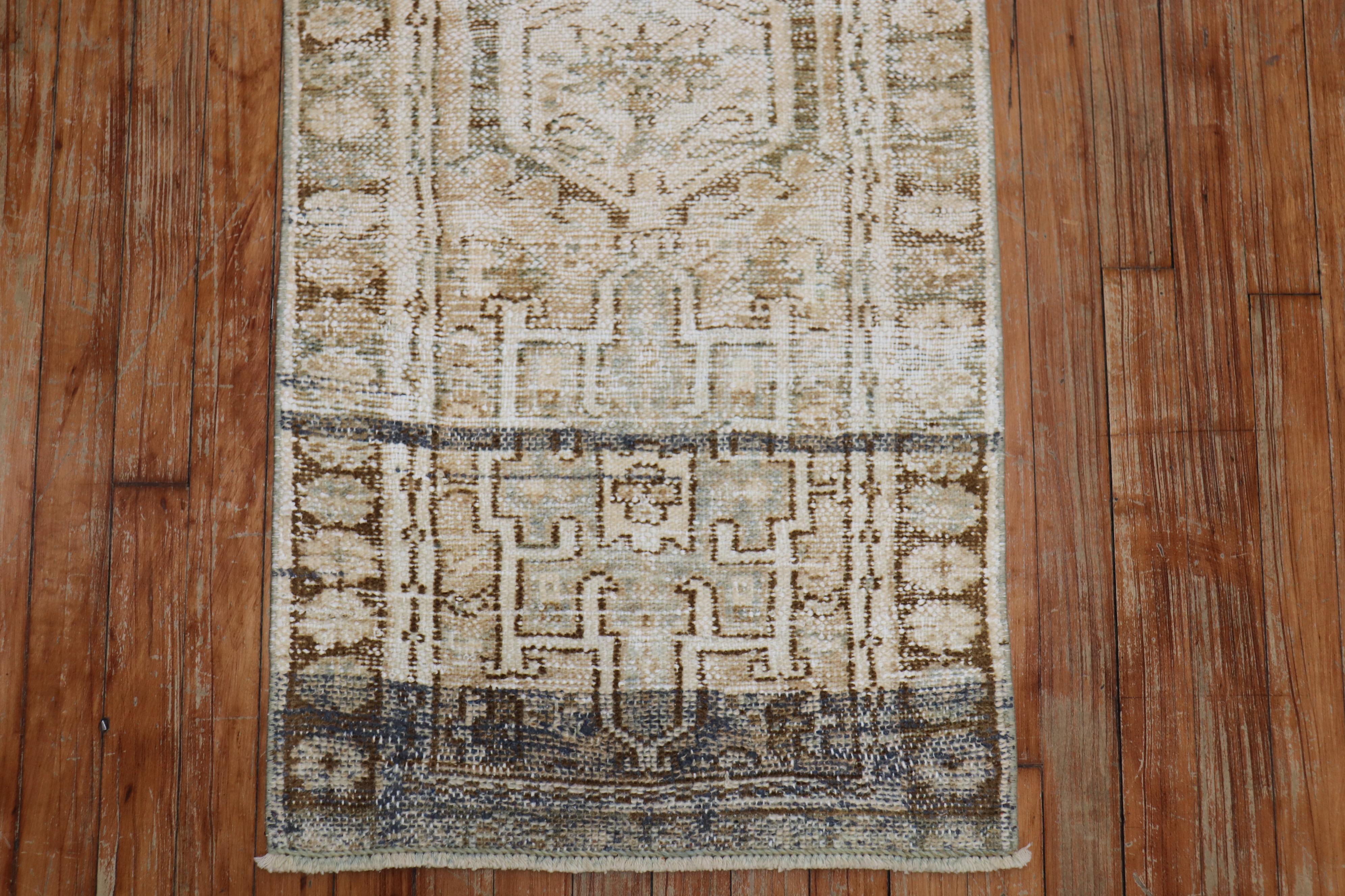 One of a kind distressed neutral Persian Heriz runner in neutral colors with a Classic traditional geometric design, circa 1920.

Measures: 1'10
