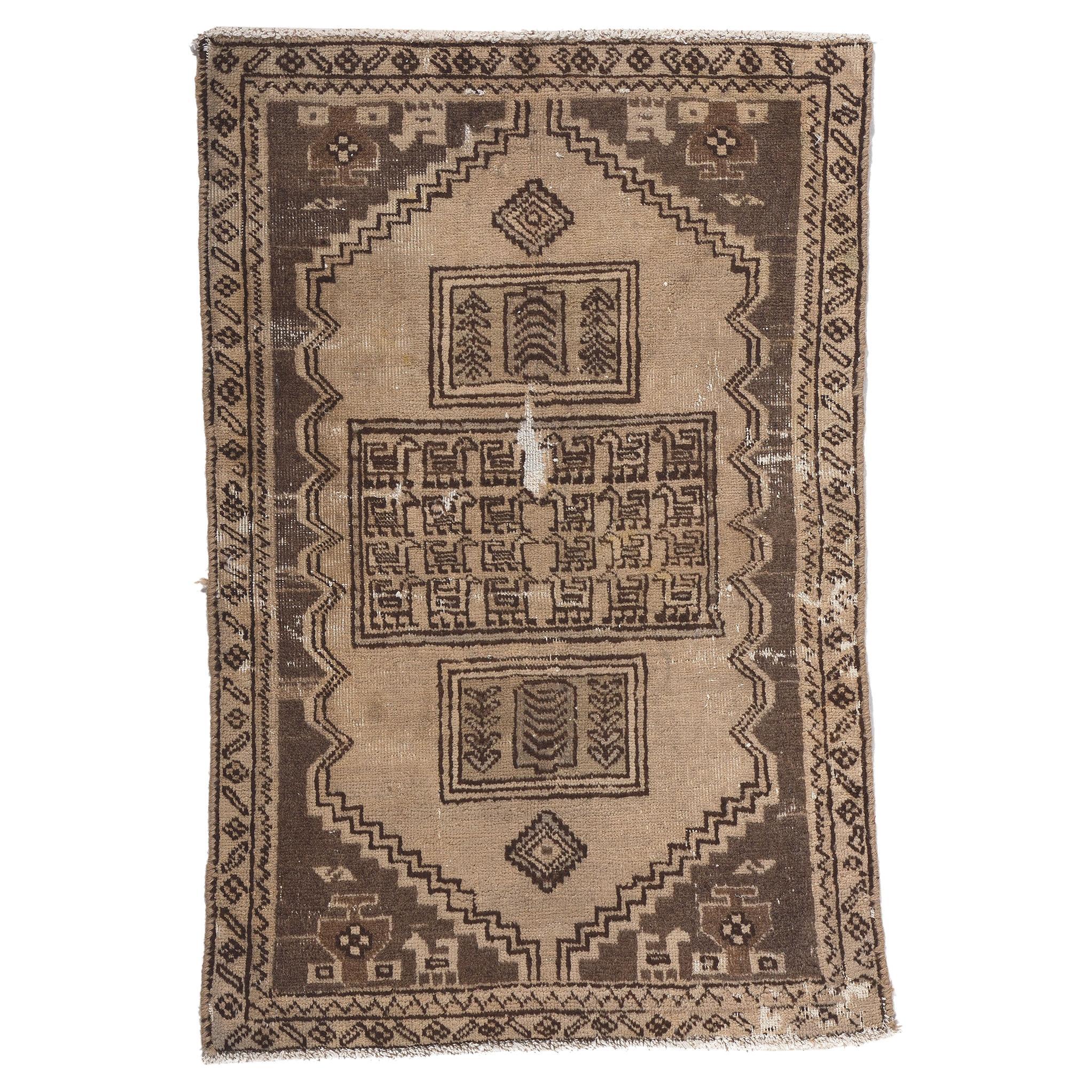 Distressed Neutral Antique Persian Rug, Nomadic Charm Meets Rustic Finesse For Sale