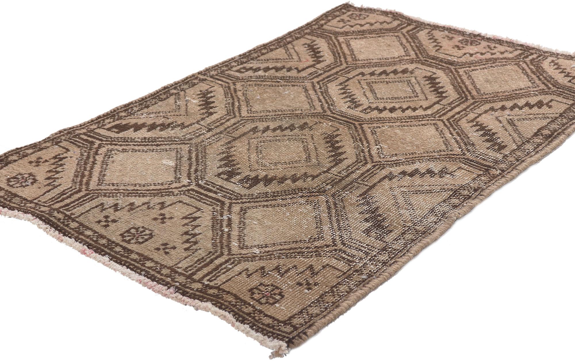 78582 Distressed Antique Persian Tabriz Rug, 01'09 x 02'09. 
Emanating rustic sensibility and weathered nomadic charm, this small antique Persian Tabriz rug is a captivating vision of woven rugged beauty. The octagonal diamond pattern and neutral