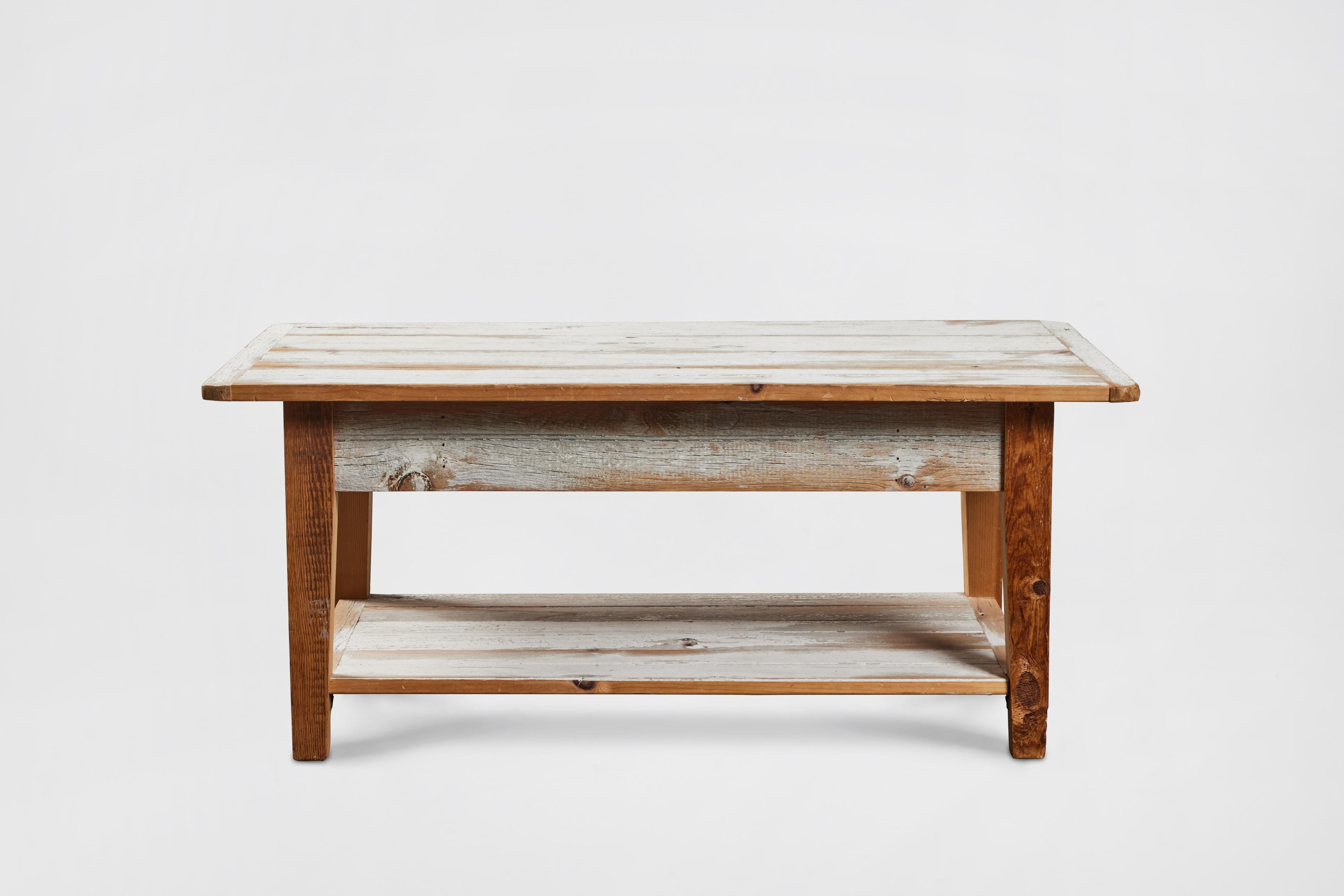 Rustic style, distressed-painted white oak coffee table. Made by John Hall Designs, Los Angeles, 1990. 