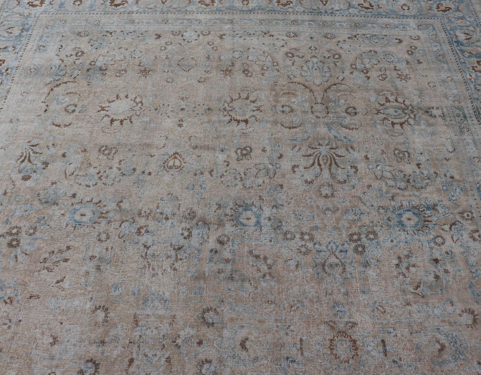 Distressed Persian Antique Mashhad Carpet with Muted Floral and Medallion Design For Sale 4