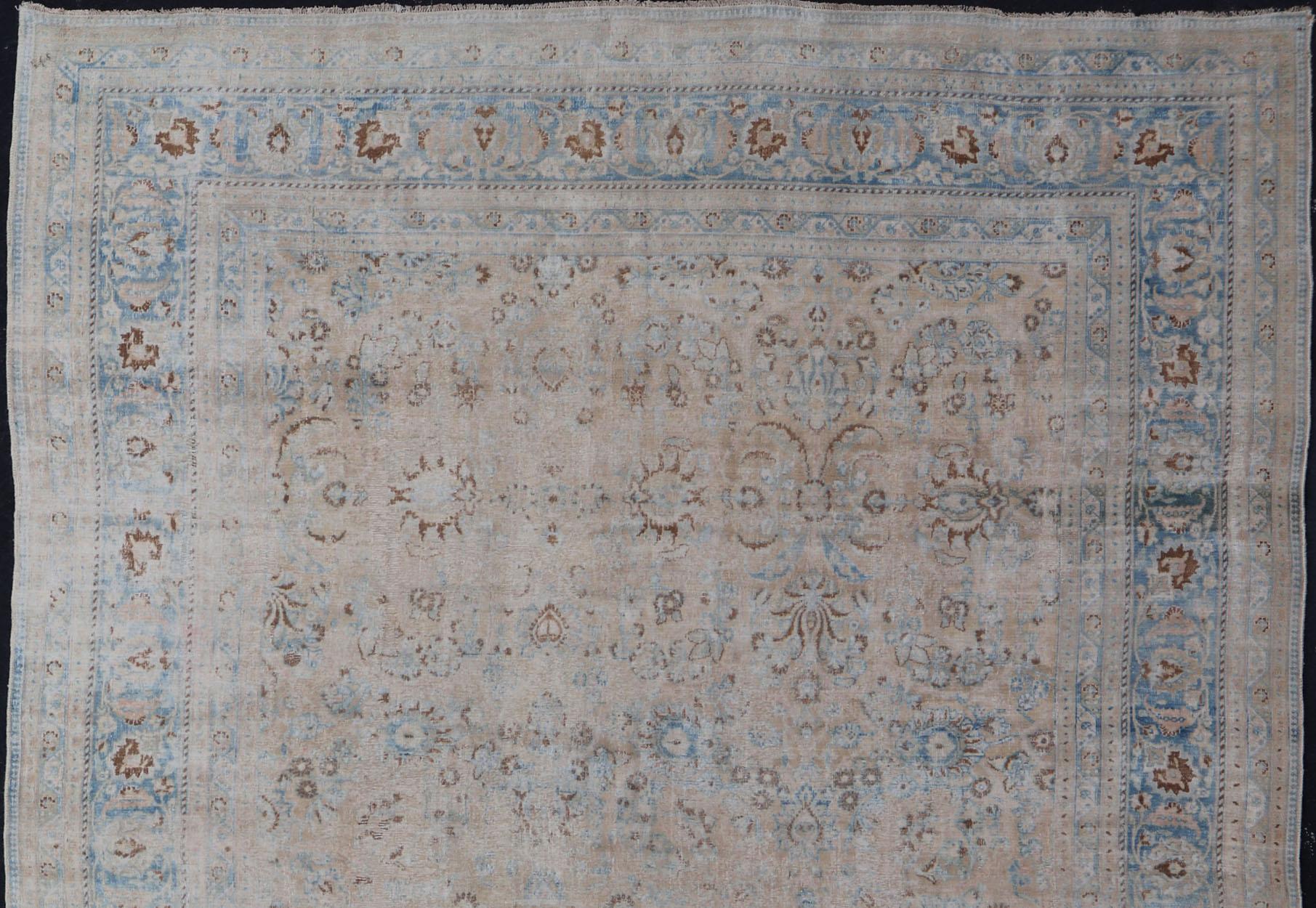 Distressed Persian Antique Mashhad Carpet with Muted Floral and Medallion Design For Sale 5