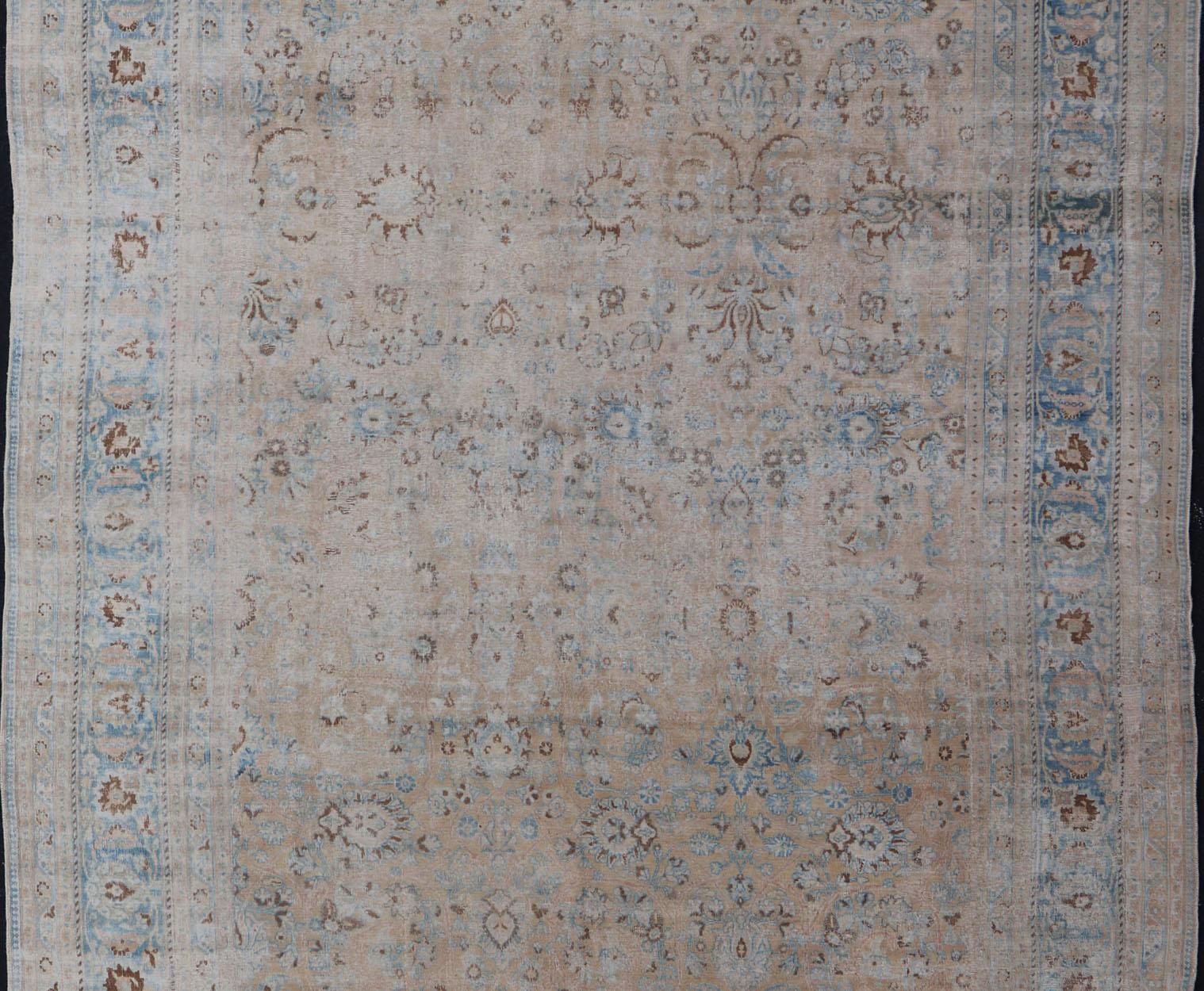 Distressed Persian Antique Mashhad Carpet with Muted Floral and Medallion Design For Sale 6