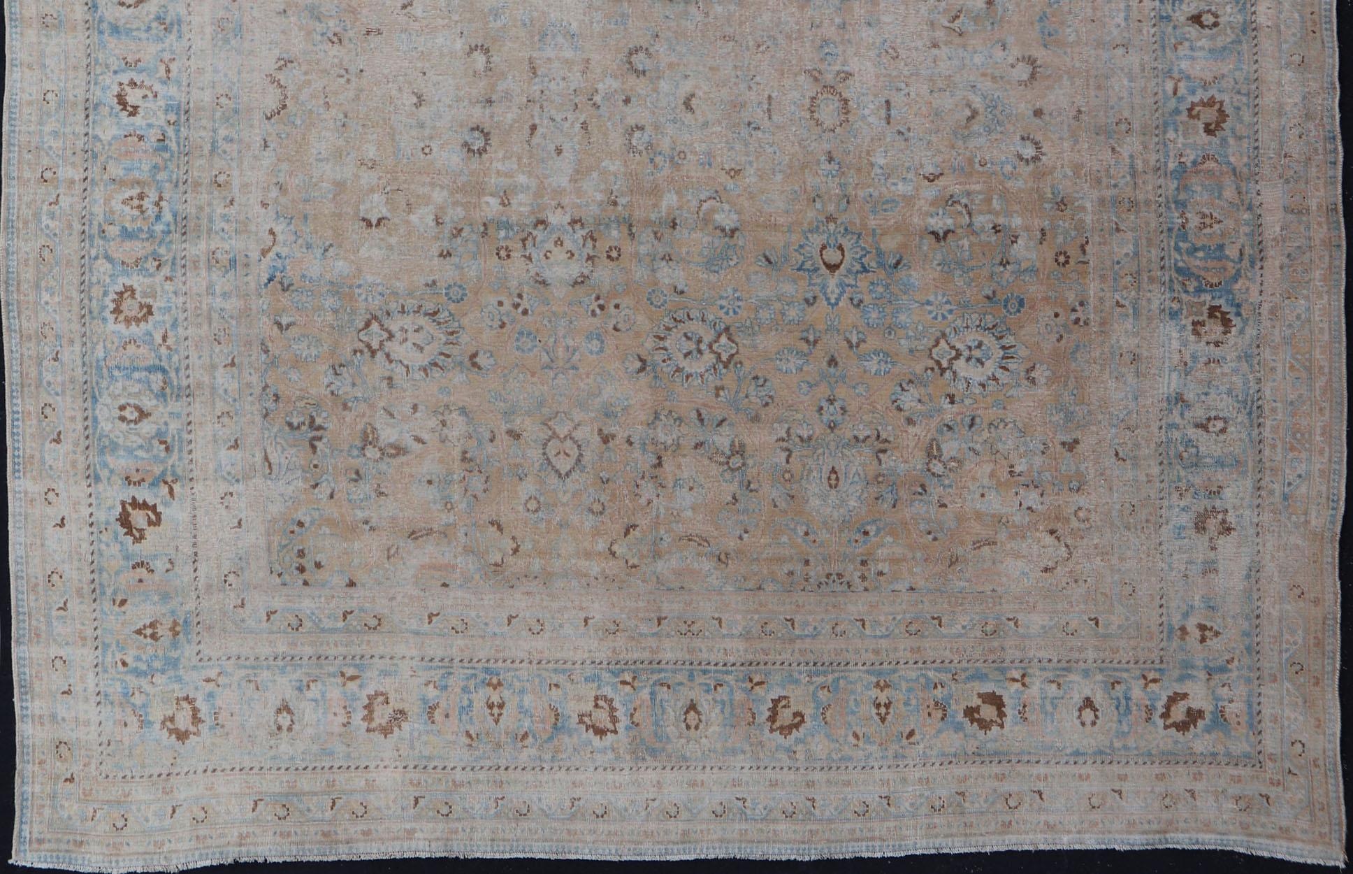Distressed Persian Antique Mashhad Carpet with Muted Floral and Medallion Design For Sale 7