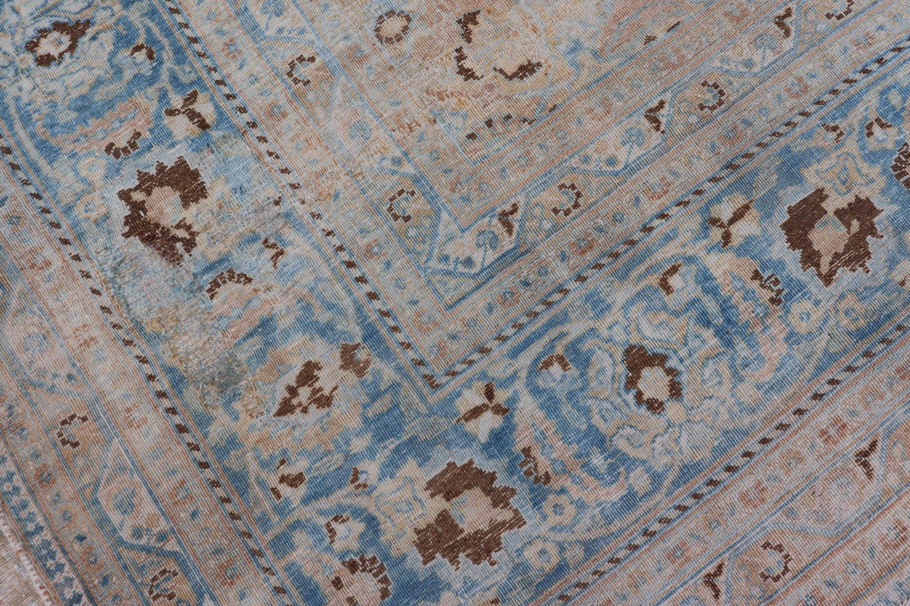 Distressed Persian Antique Mashhad Carpet with Muted Floral and Medallion Design For Sale 8