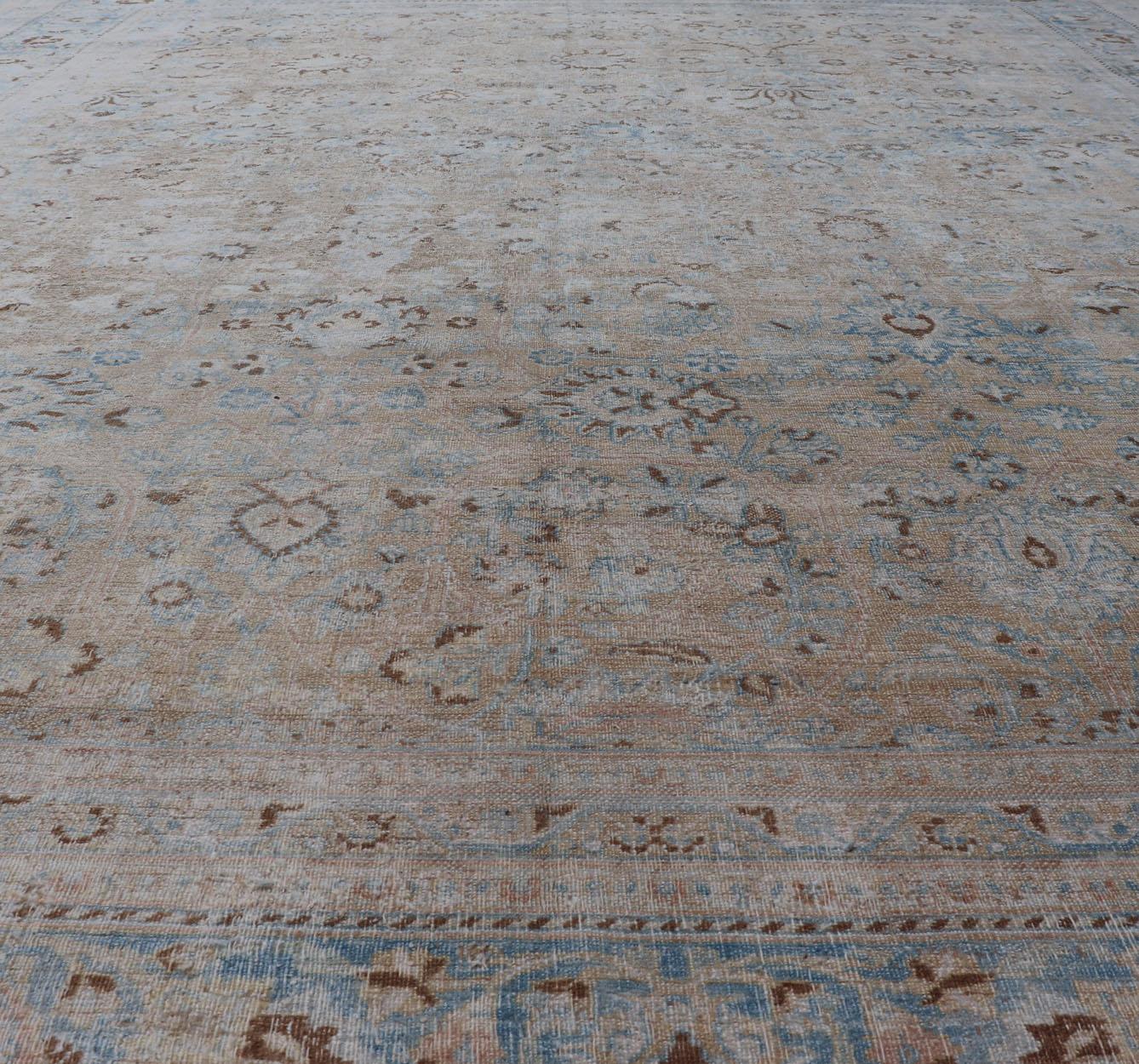 Distressed Persian Antique Mashhad Carpet with Muted Floral and Medallion Design For Sale 11