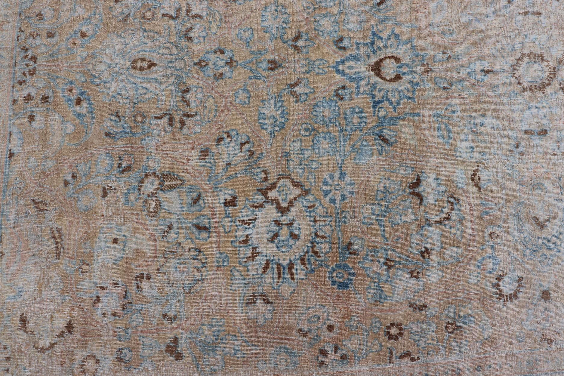 Distressed Persian Antique Mashhad Carpet with Muted Floral and Medallion Design For Sale 1
