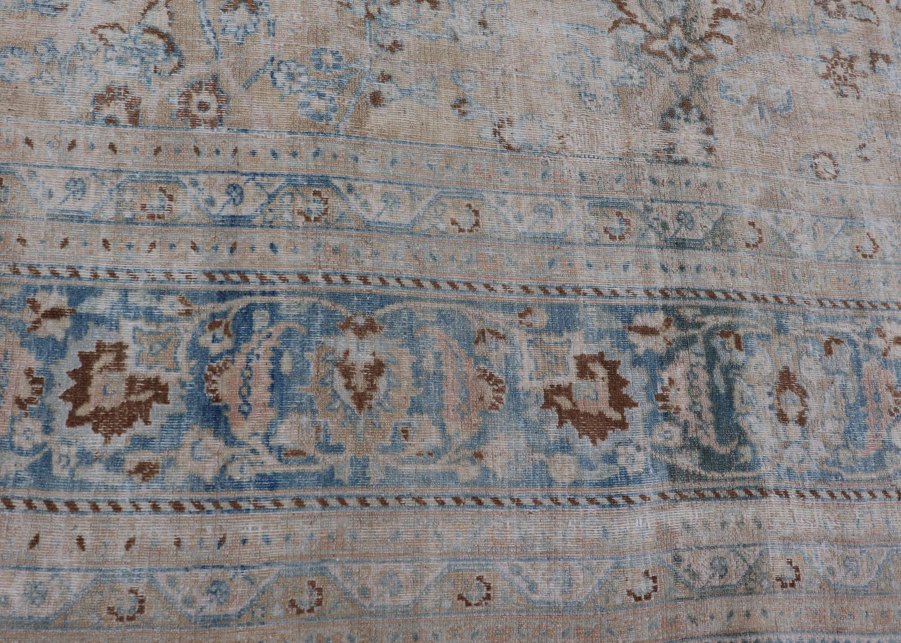 Distressed Persian Antique Mashhad Carpet with Muted Floral and Medallion Design For Sale 2
