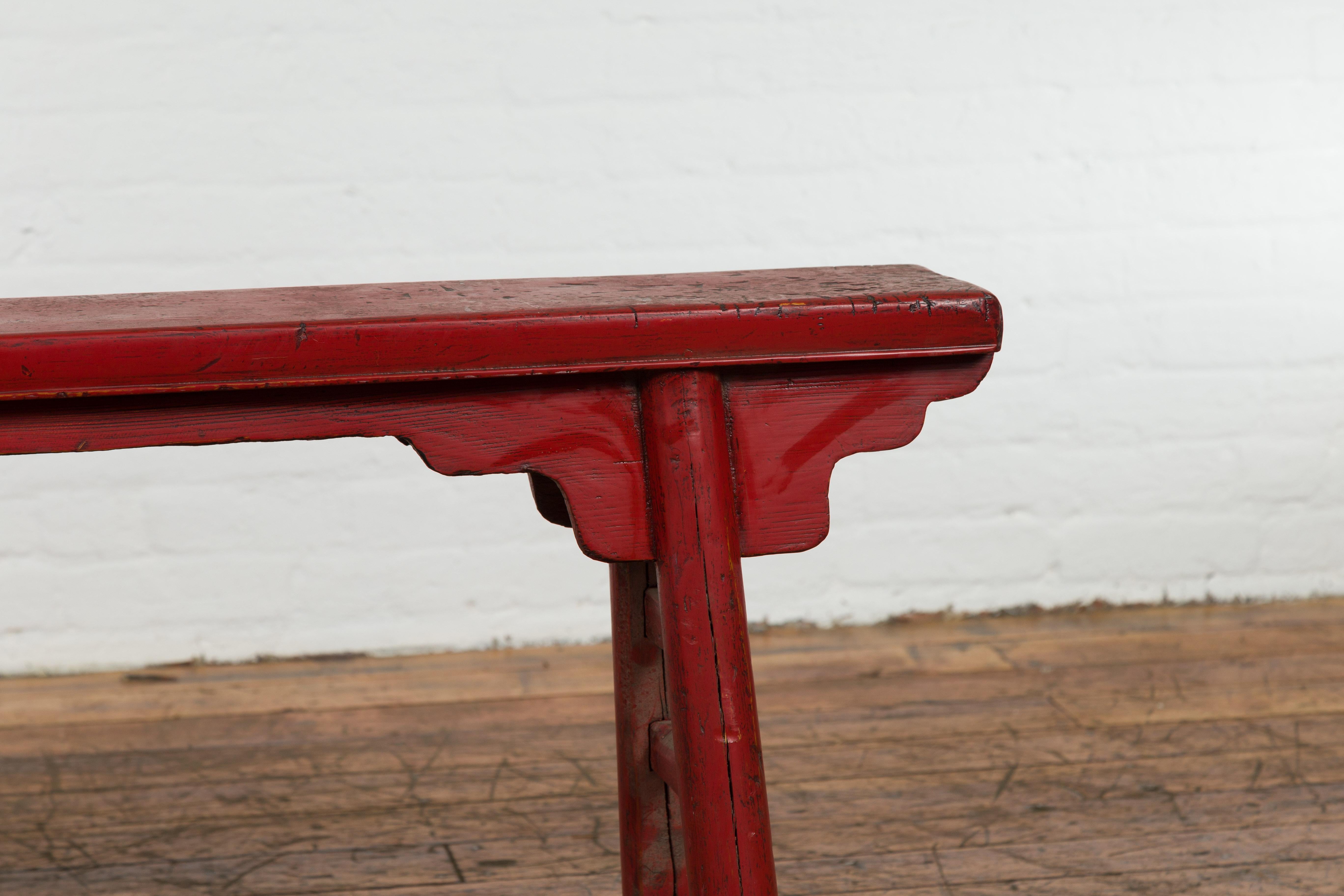 Carved Red Lacquered Vintage Bench with A-Form Base For Sale
