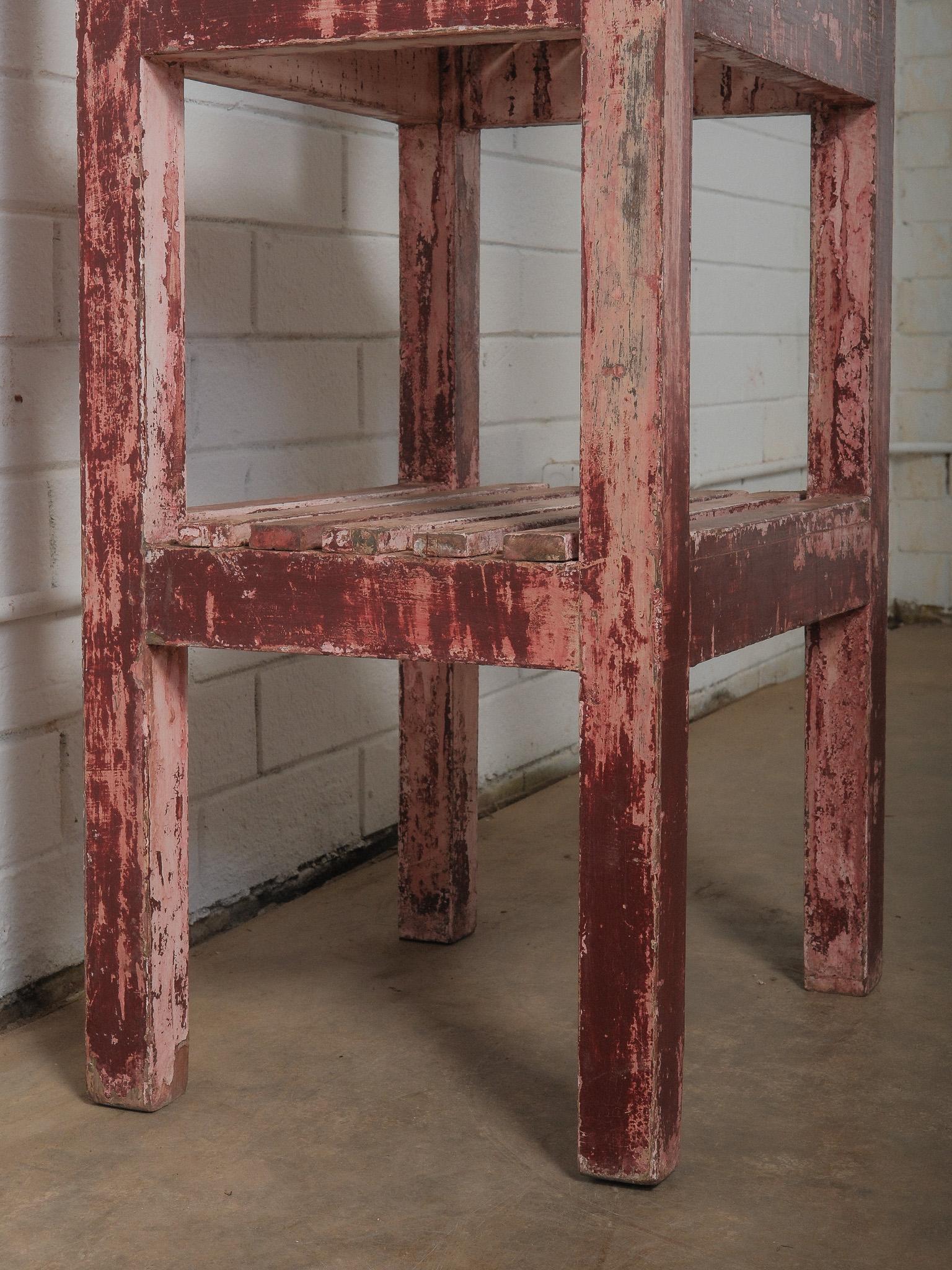 Distressed Red Wooden Shelf with Layered Patina For Sale 4
