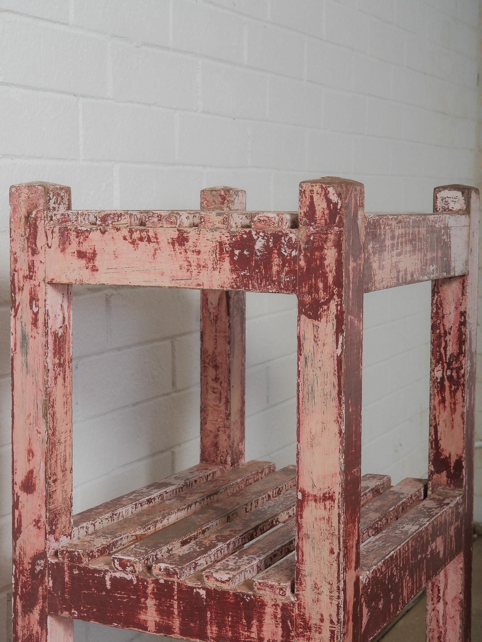 Painted Distressed Red Wooden Shelf with Layered Patina For Sale