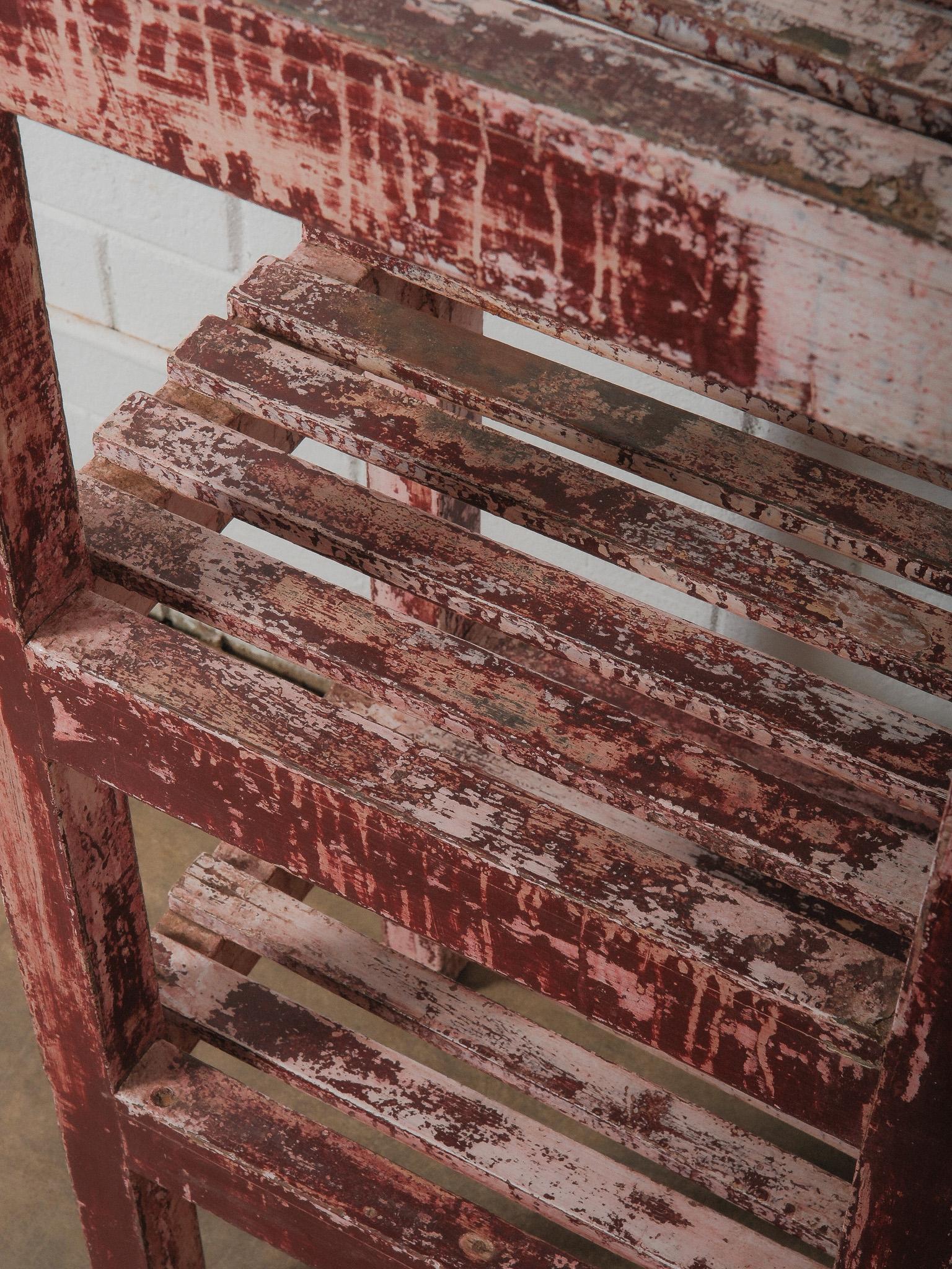 Distressed Red Wooden Shelf with Layered Patina For Sale 2