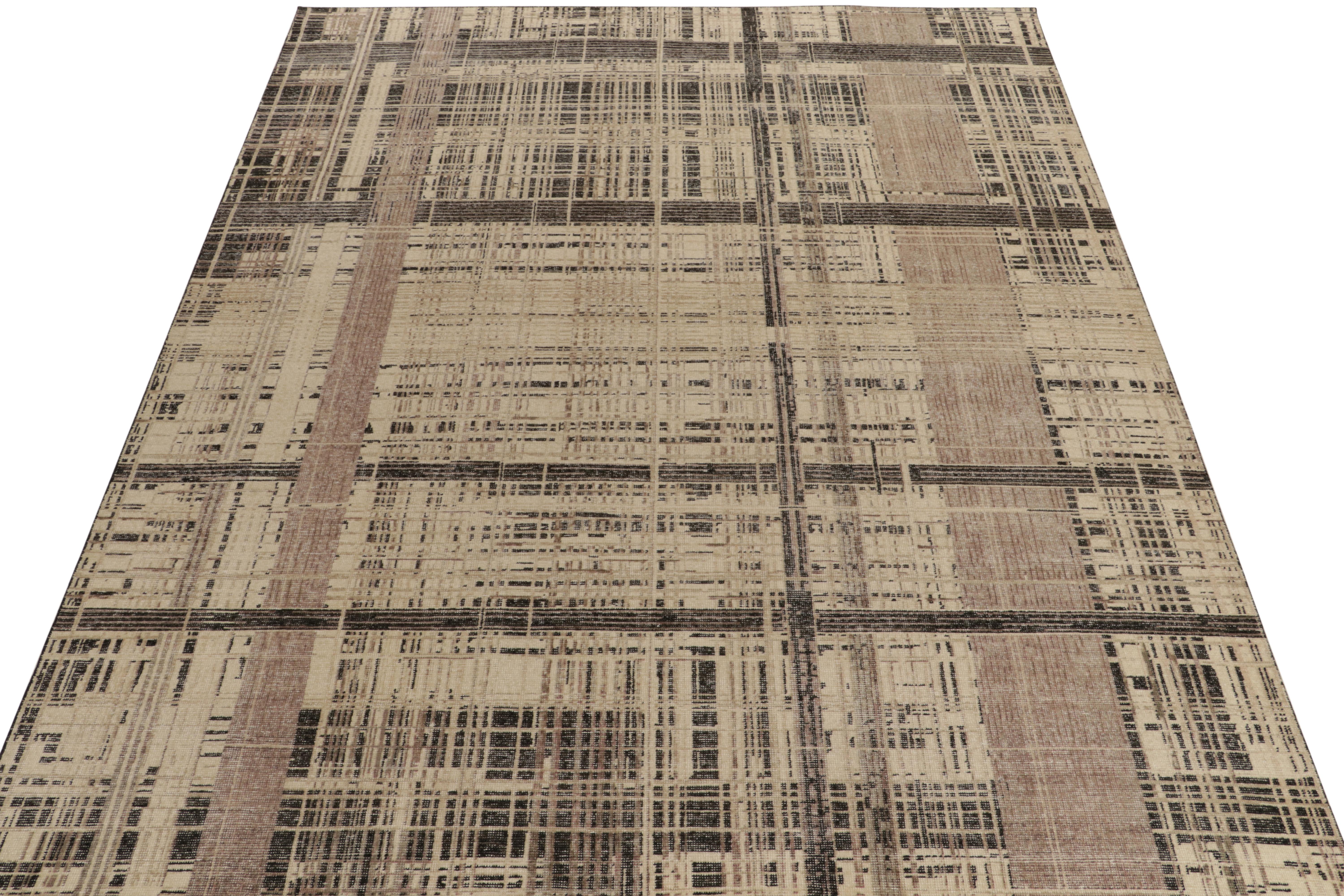 From Rug & Kilim’s Homage collection, a 9x12 distressed style abstract rug marking a dextrous take on contemporary styles. The imagination applies geometry in muted beige, brown & charcoal black striations playing on a low sheared pile for
