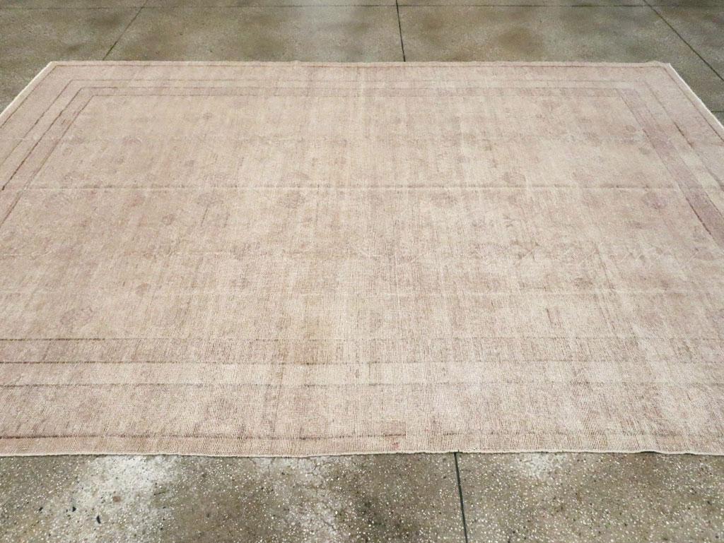 Distressed Style Late 20th Century Handmade East Turkestan Room Size Carpet In Good Condition For Sale In New York, NY