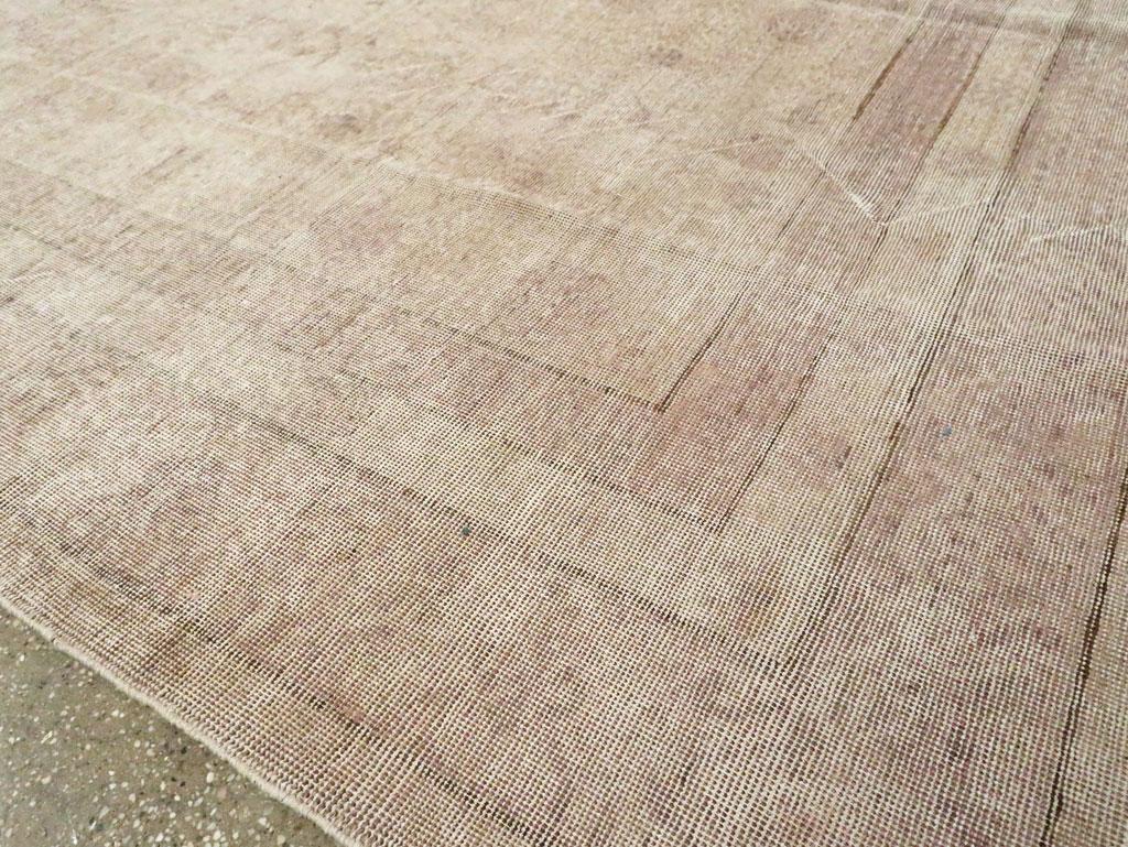 Distressed Style Late 20th Century Handmade East Turkestan Room Size Carpet For Sale 1