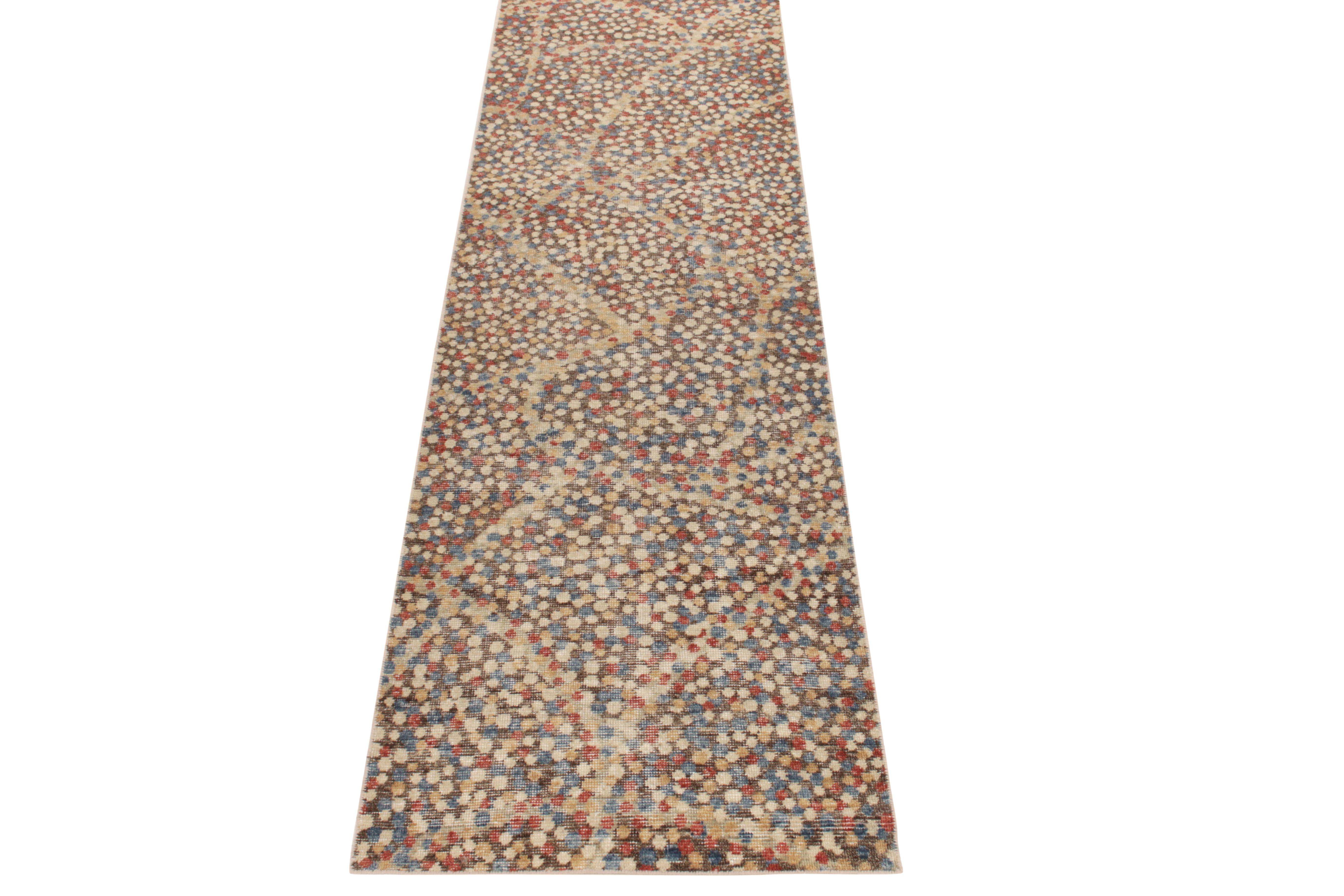 From Rug & Kilim’s Dots Line in their acclaimed Homage Collection, a 3x10 distressed style custom runner design featuring a riot of color in a mature tones of sky blue, crimson red & beige-brown in their abstract brilliance. A hand-knotted piece