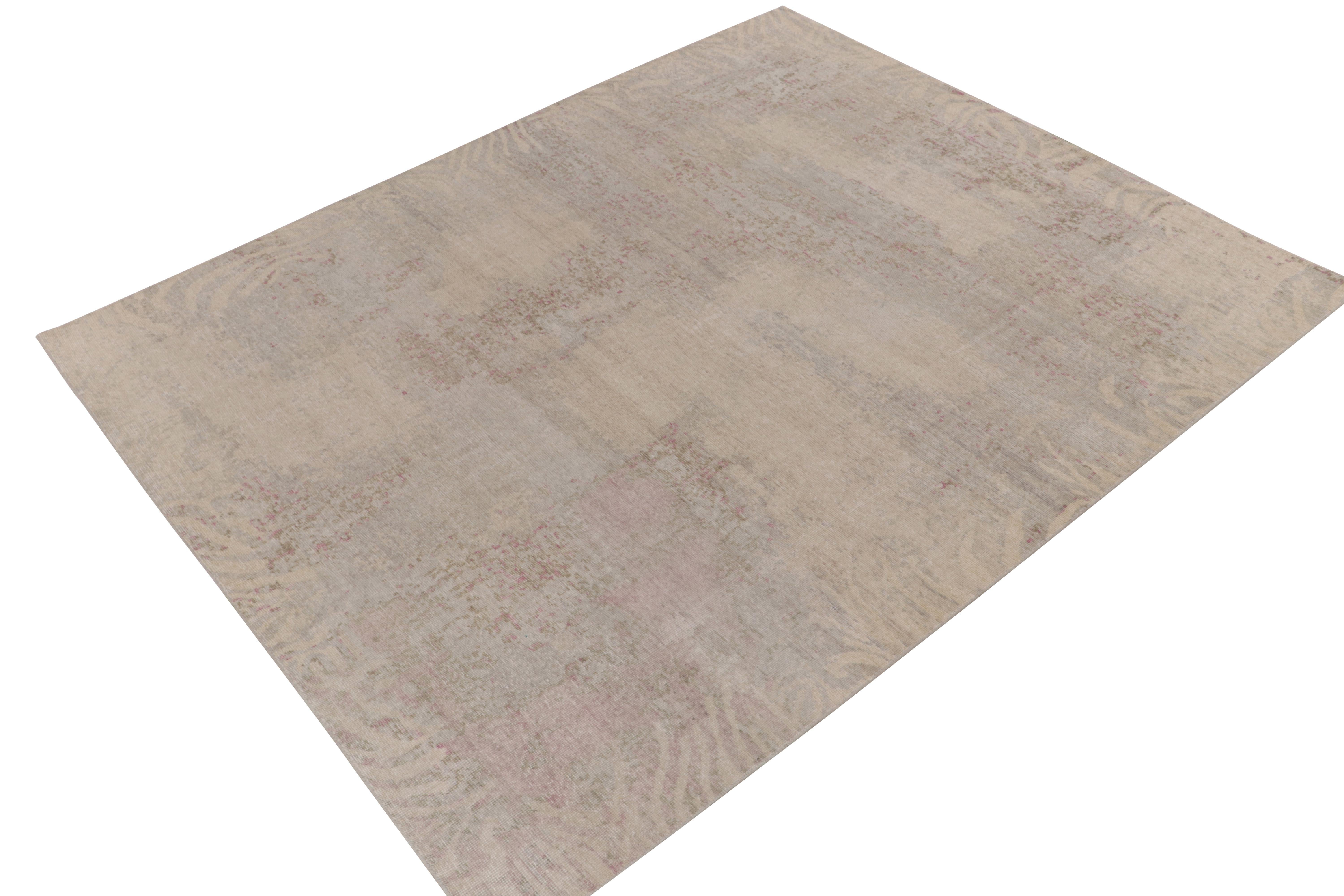 From Rug & Kilim’s Homage collection, an 8 x 10 distressed style abstract rug relishing a forgiving play of luscious beige, brown & blue for an alluring take on this textural style. Connoisseurs may note specks of rich purple for an inviting