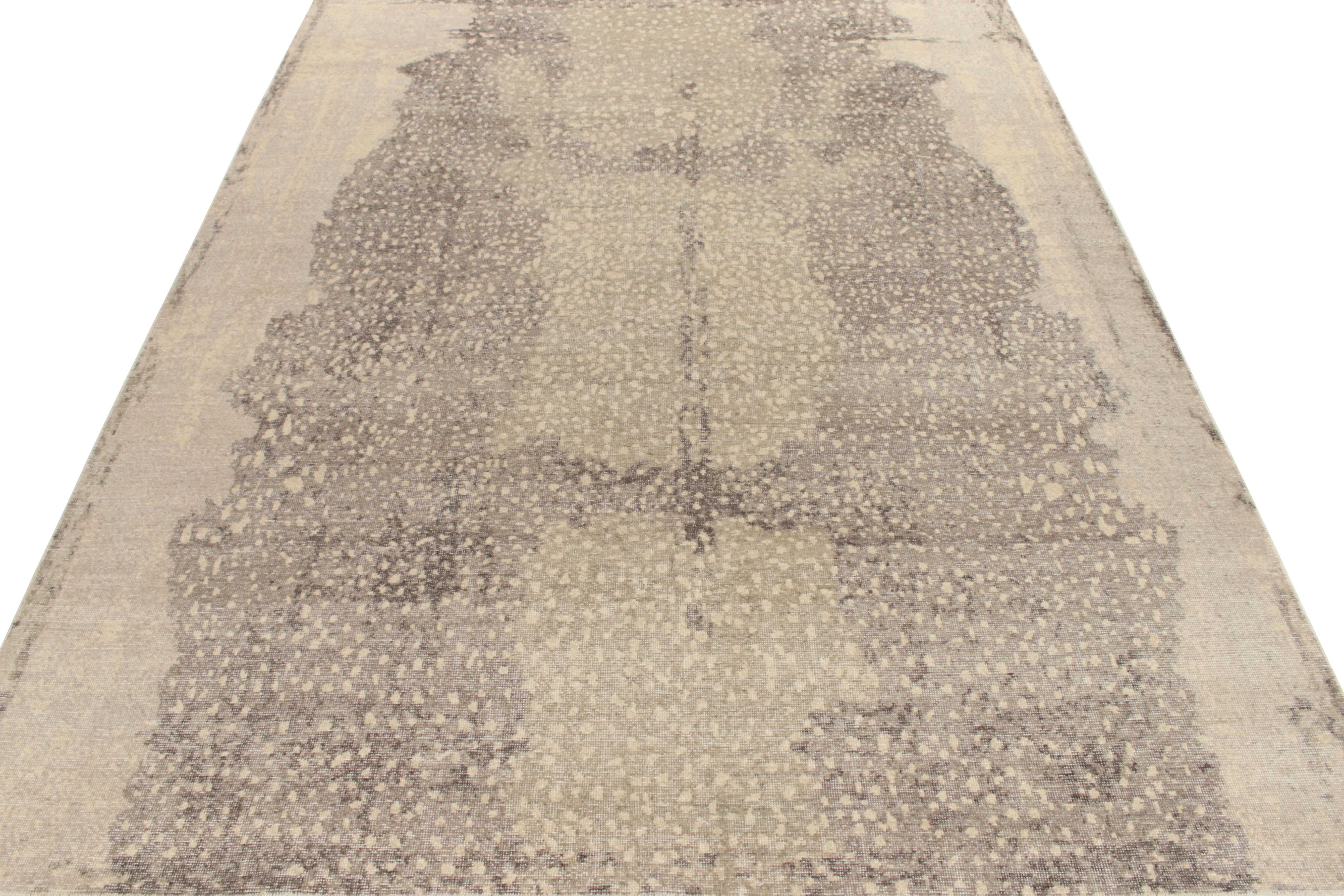 Hand-knotted in wool, a 9x12 contemporary rug from our Homage collection featuring a thought provoking abstract pattern in beige-grey tones playing positive negative for a refined take in distressed style further carrying a shabby chic appeal in